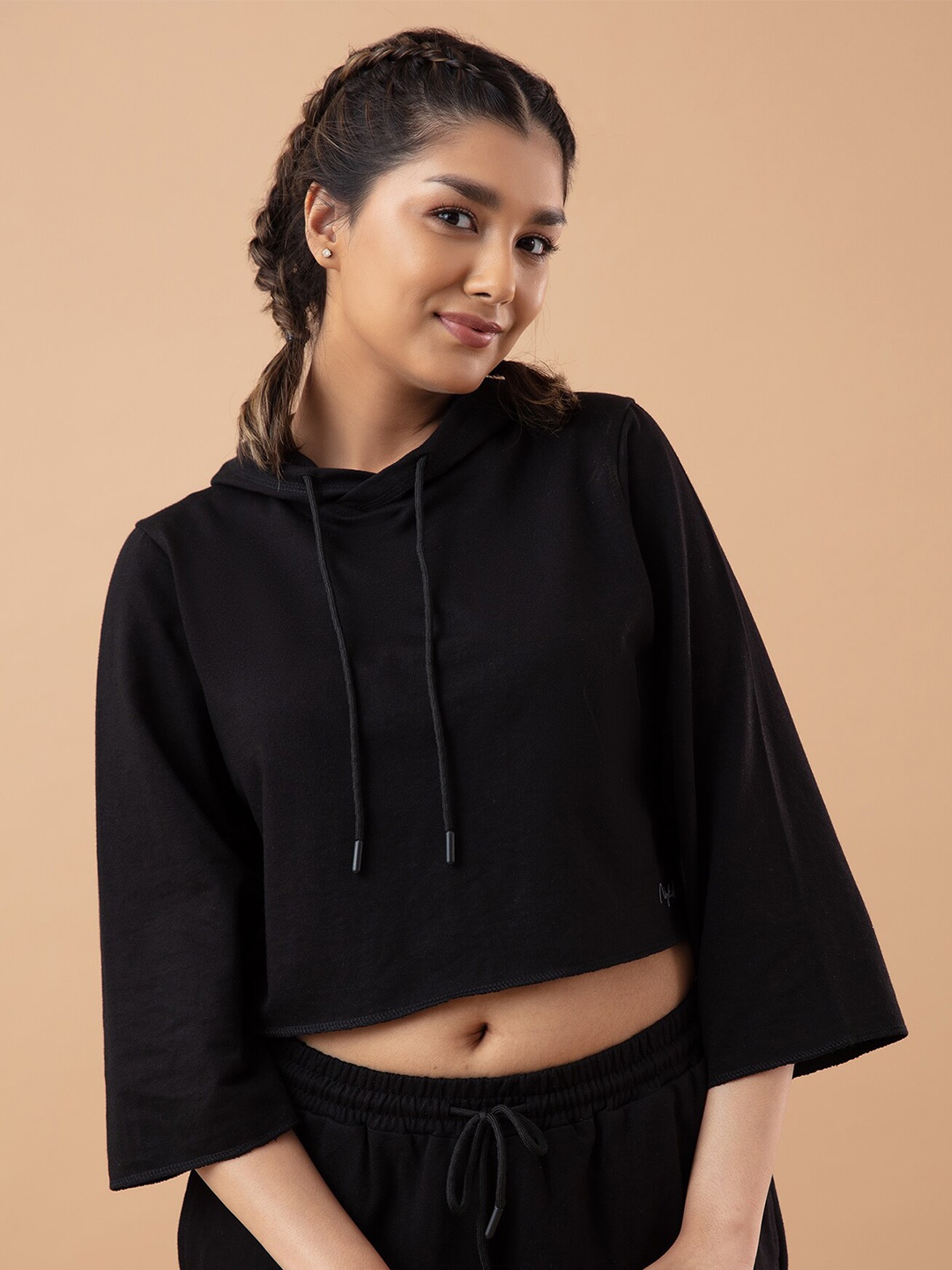 

Nykd Women Black Solid Sweatshirt