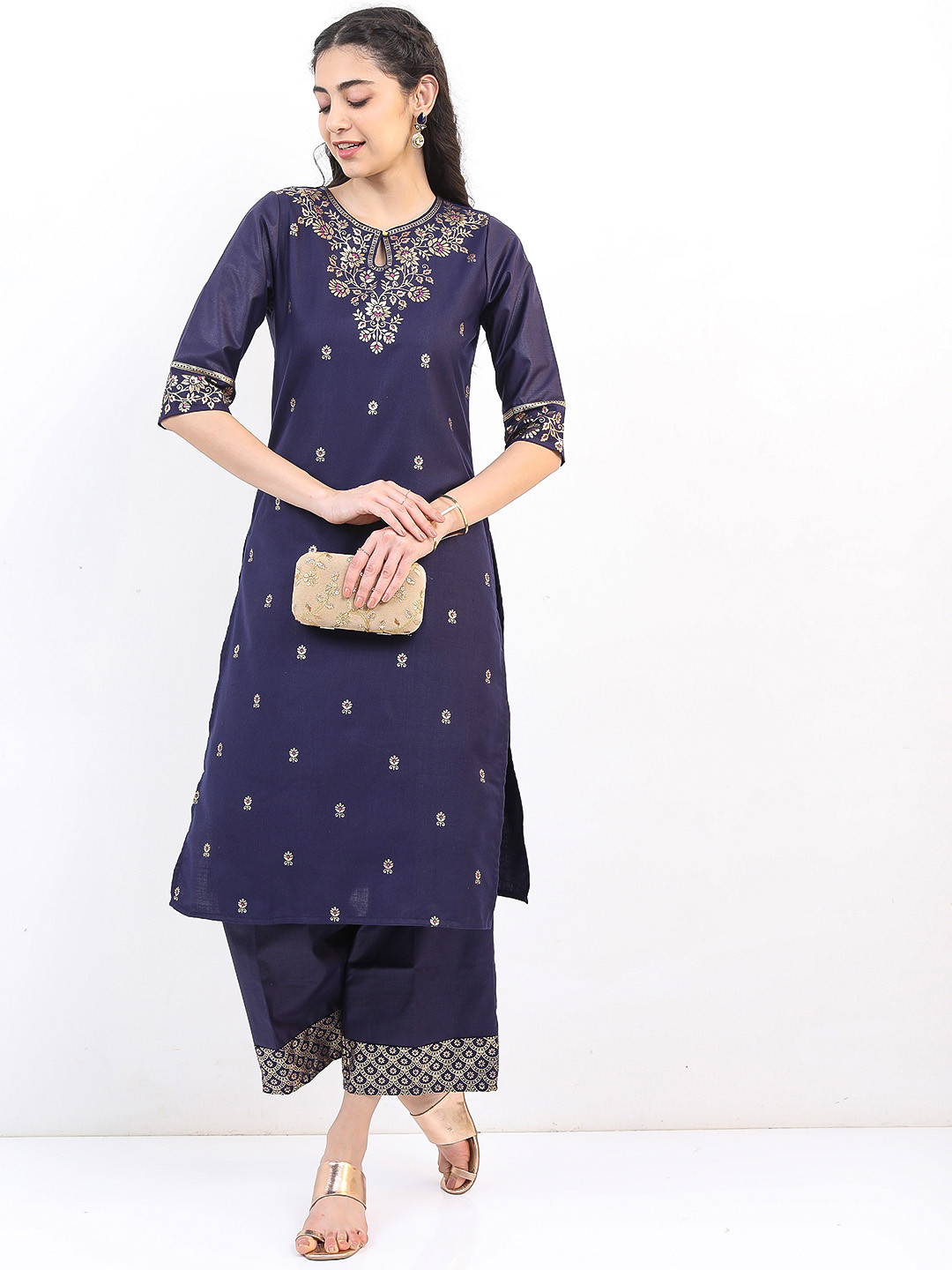 

Vishudh Women Navy Blue Floral Printed Kurta with Palazzos