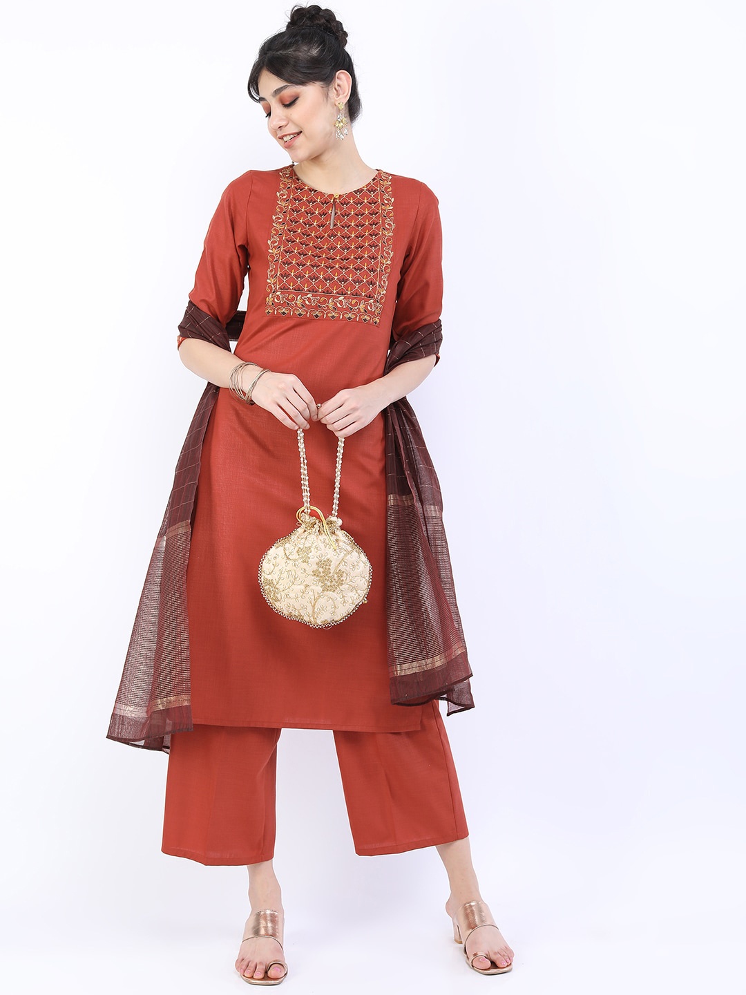 

Vishudh Women Rust Floral Kurta with Palazzos & With Dupatta