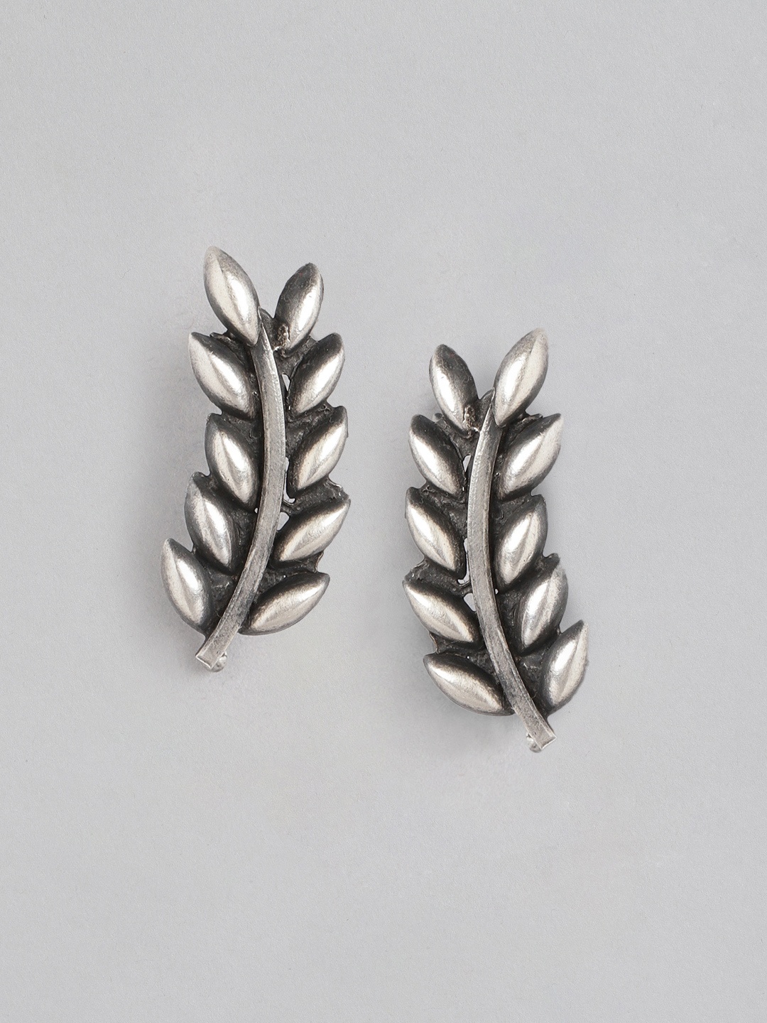 

Zavya Silver-Toned Leaf Shaped Studs Earrings