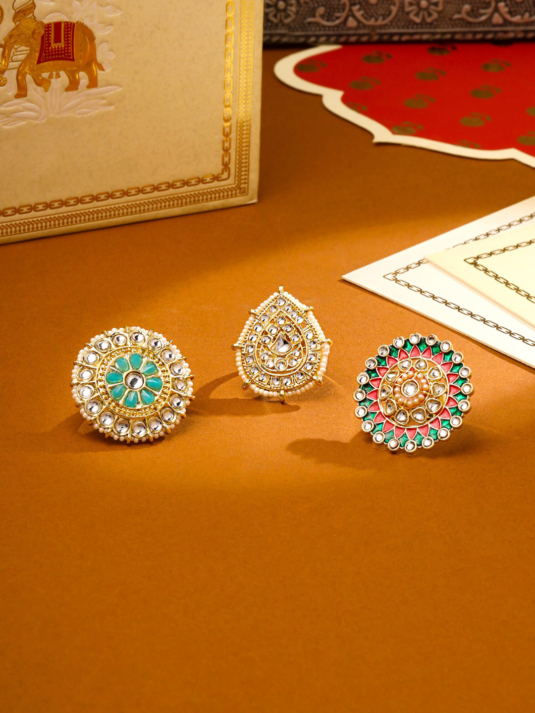 

Yellow Chimes Women Set of 3 White Kundan And Moti Studded Finger Ring, Gold