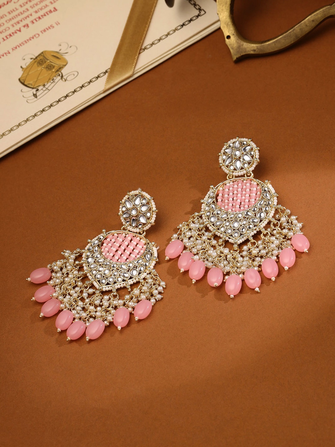 

Yellow Chimes Pink Gold-Plated White Kundan Moti Studded Chandbali Earring