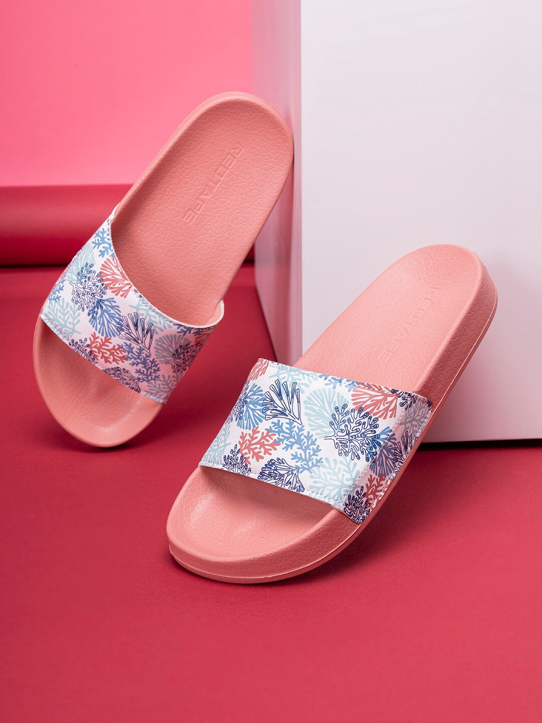 

Red Tape Women Pink & White Printed Rubber Sliders