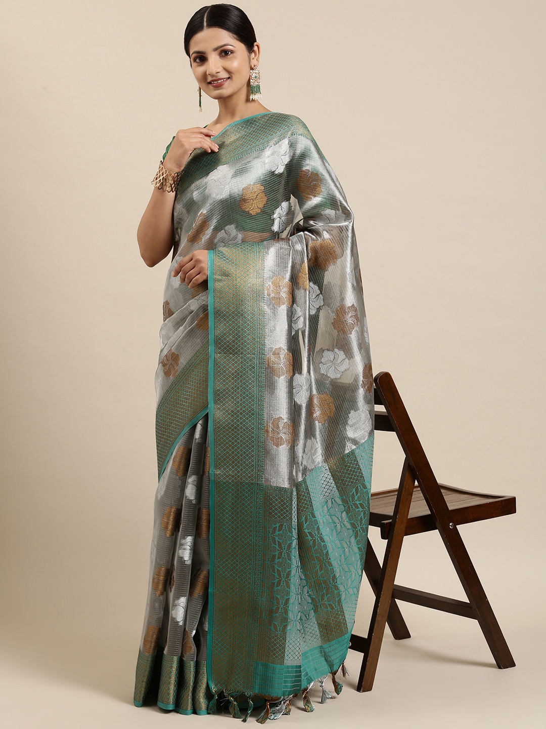 

Pothys Silver-Toned & Blue Floral Zari Jute Silk Saree