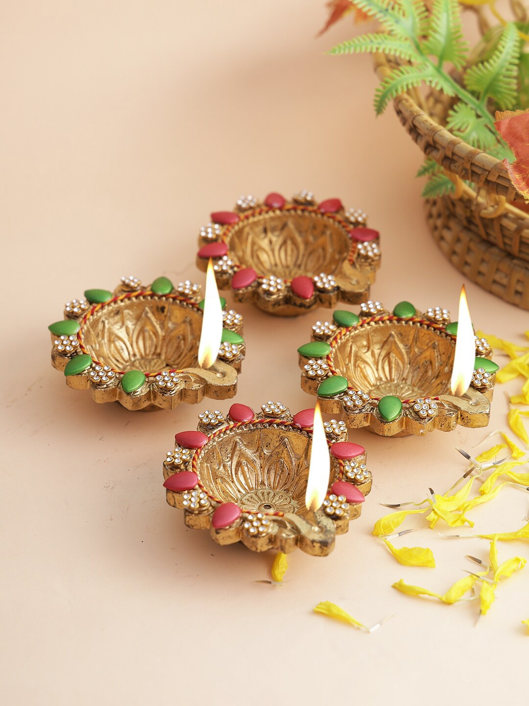 

Aapno Rajasthan Set Of 4 Gold-Toned & Red Terracotta Diyas