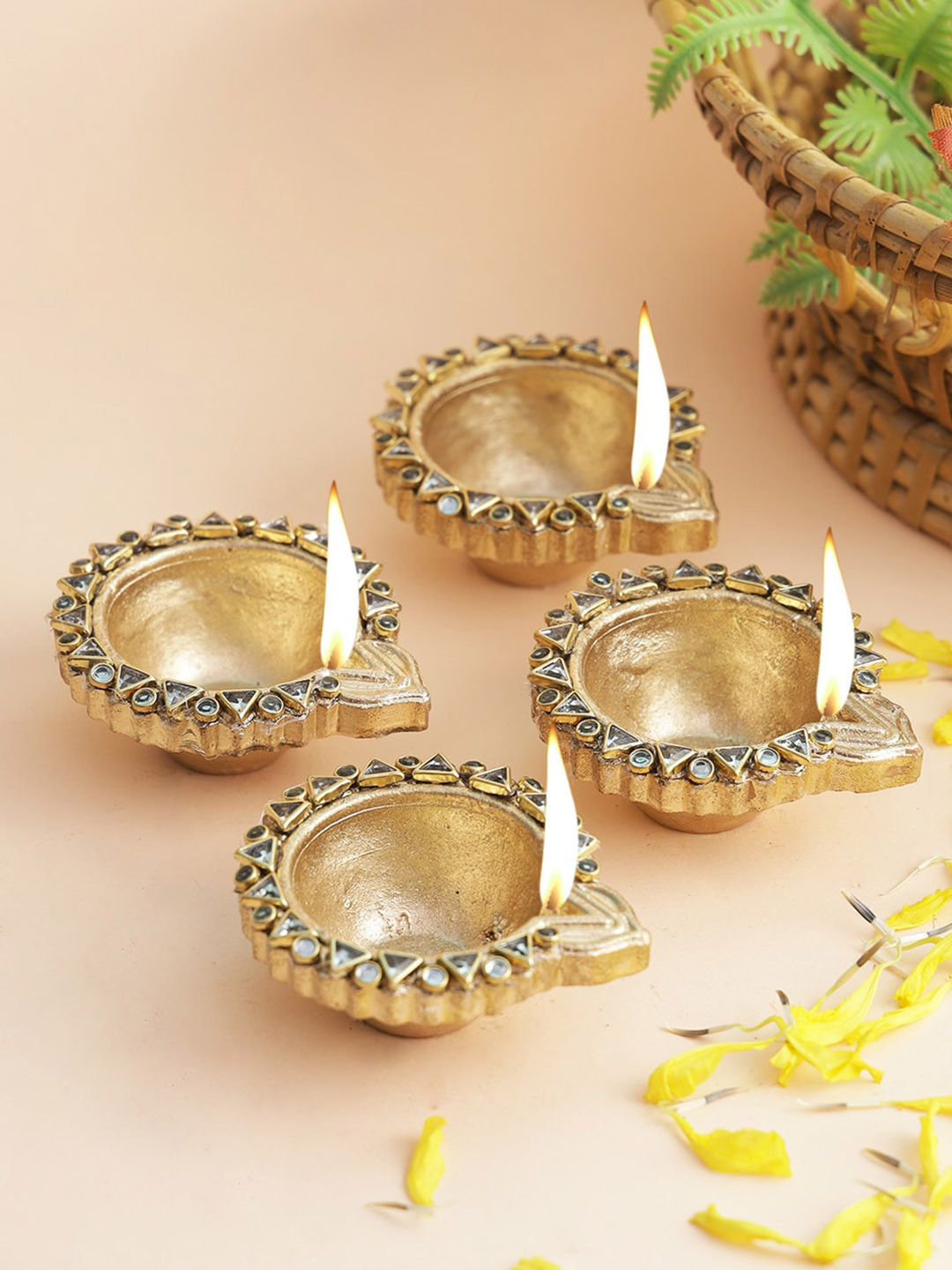 

Aapno Rajasthan Set Of 4 Gold-Toned Handmade Terracotta Diyas