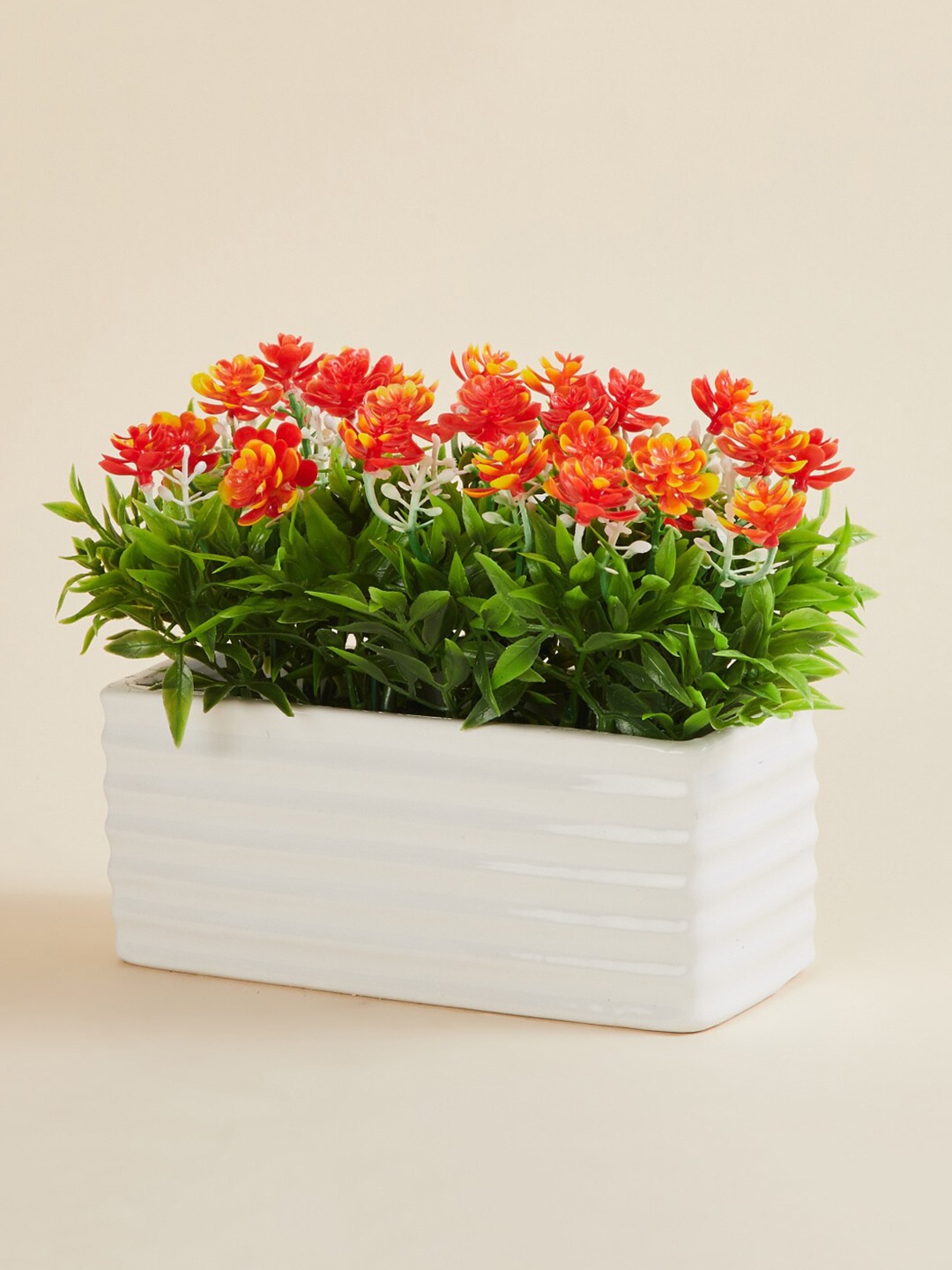 

Home Centre Orange Fiesta Flurry Textured Artificial Potted Plant, White