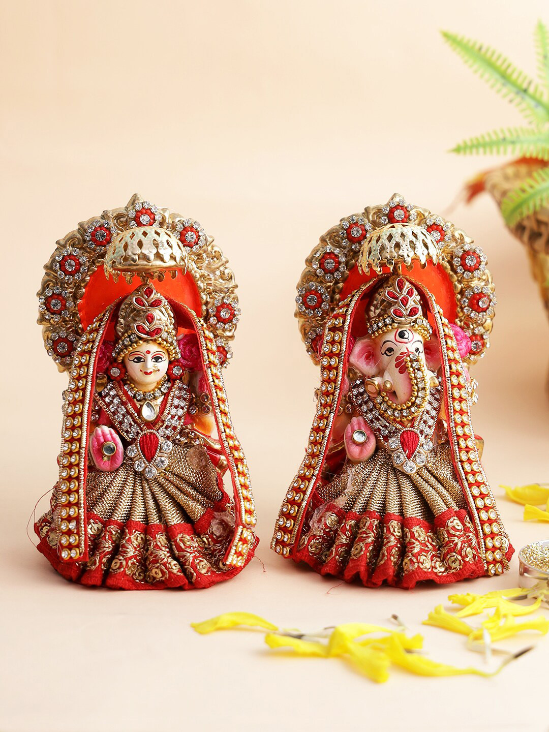 

Aapno Rajasthan Gold-Colored Red Laxmi Ganesha Idol With Stone Embellishment