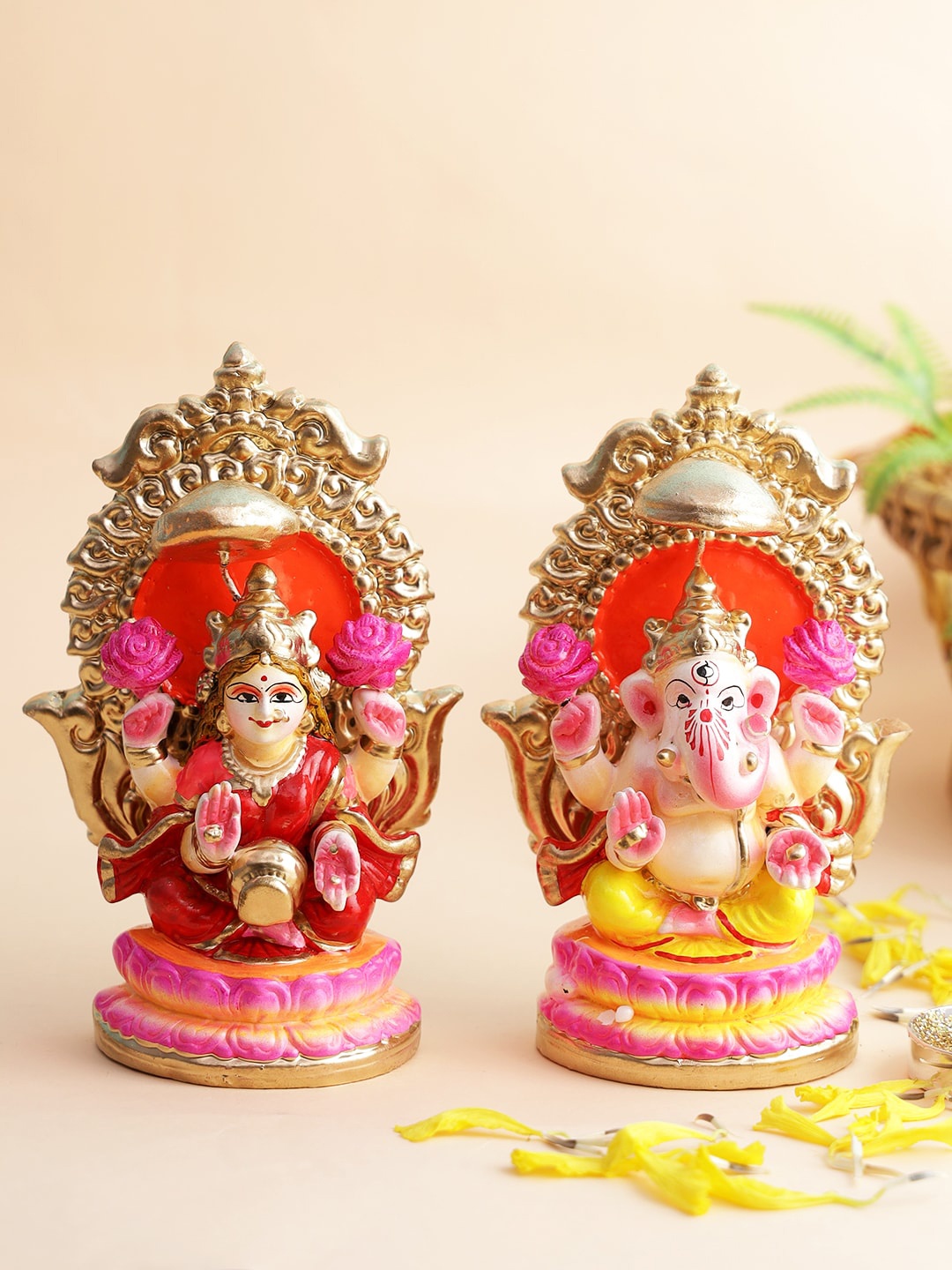 

Aapno Rajasthan Gold-Colored Pink Laxmi Ganesh Idol Set Sitting On Throne