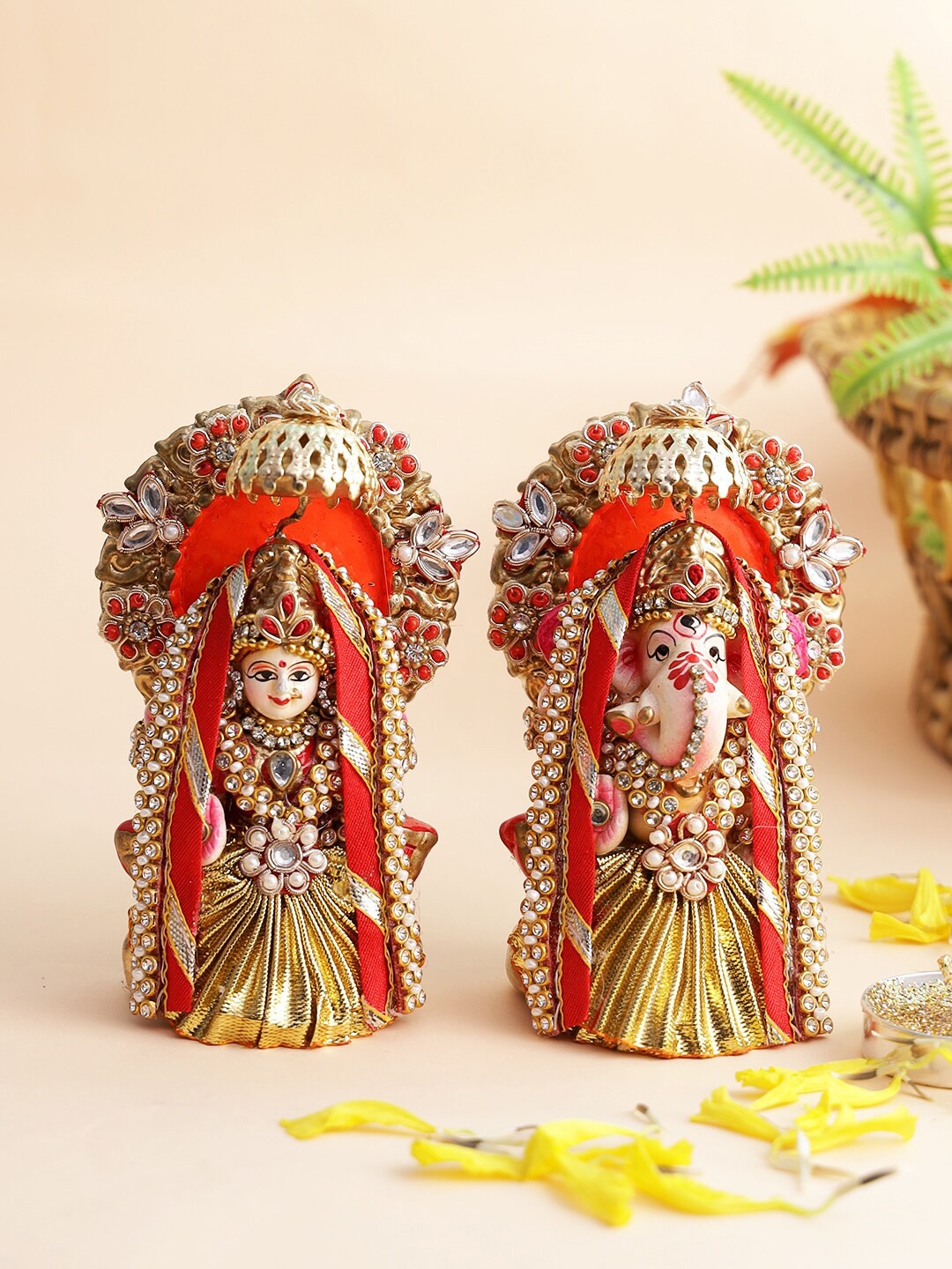 

Aapno Rajasthan Gold-Colored Red Stone Stud Laxmi Ganesh Idol Set