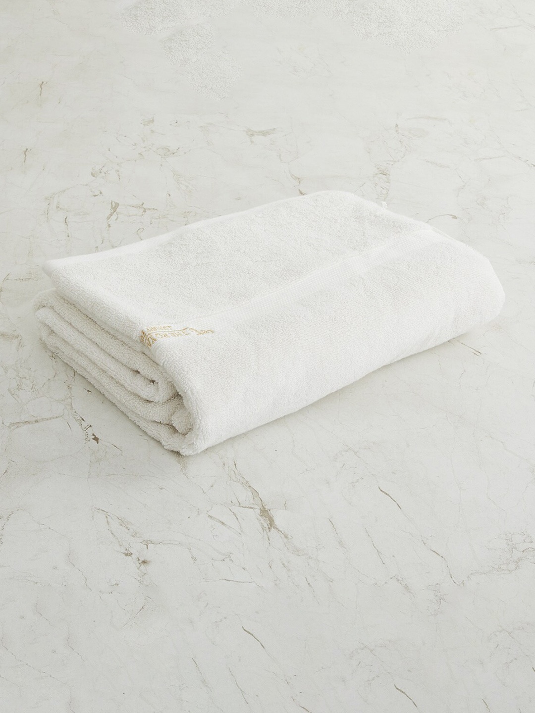 

Home Centre Off White Solid 380 GSM Cotton Bath Towel