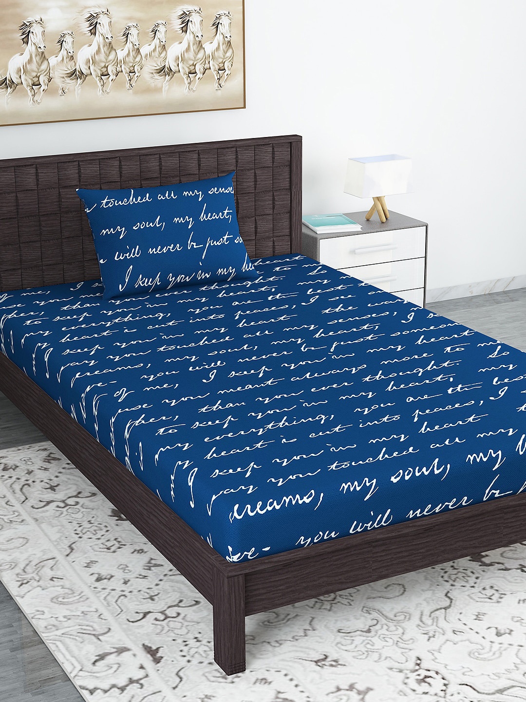 

Divine Casa Navy Blue & White Typography 120 TC Single Bedsheet with 1 Pillow Covers