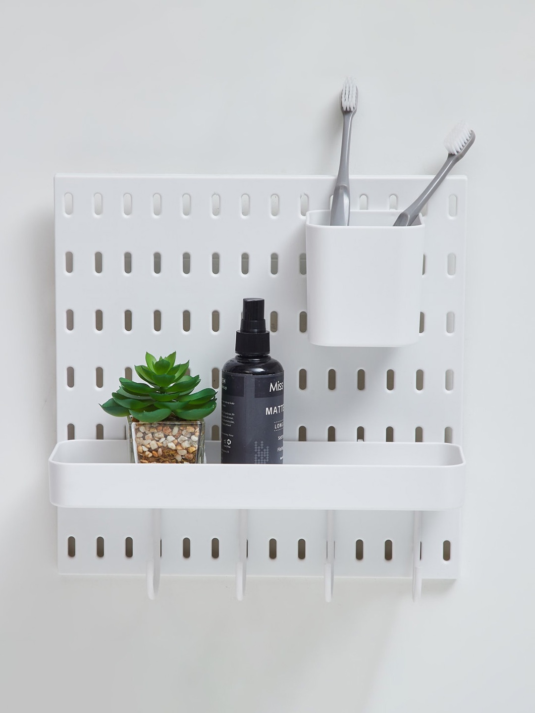 

Home Centre White Solid Pegboard Combinations Wall Organiser