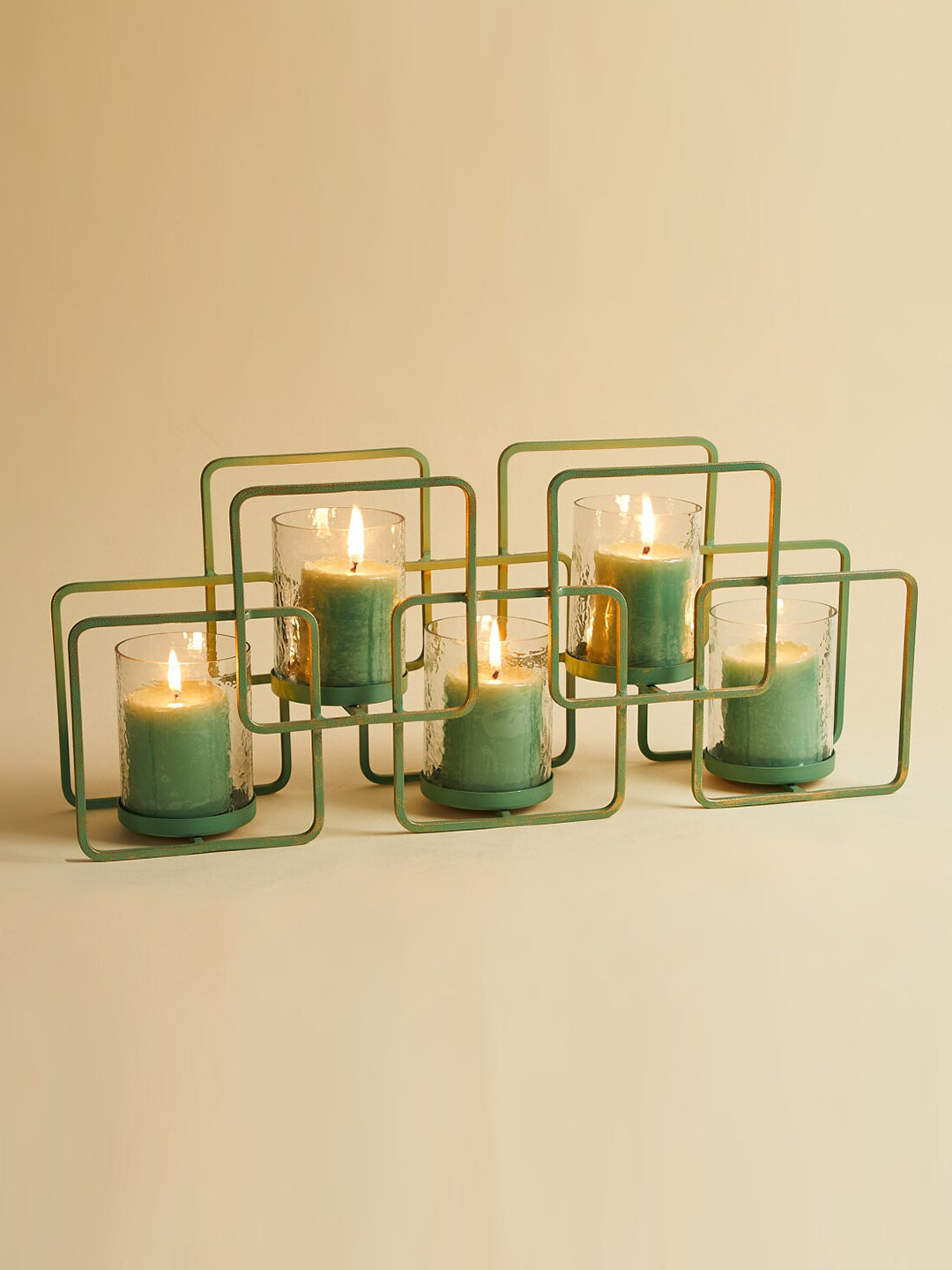 

Home Centre Green Solid Votive Candle Holder With Stand