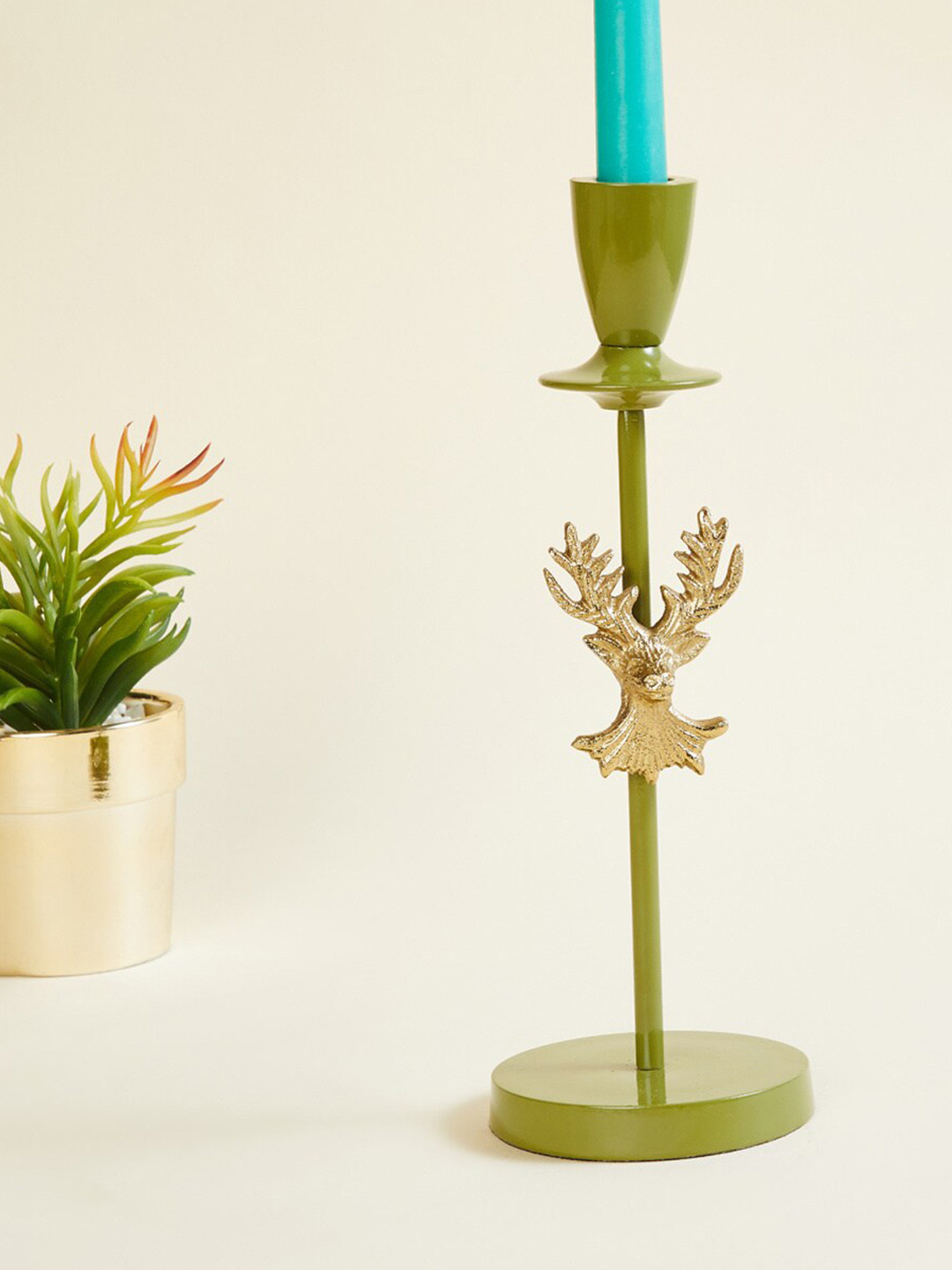 

Home Centre Green Solid Candle Holders