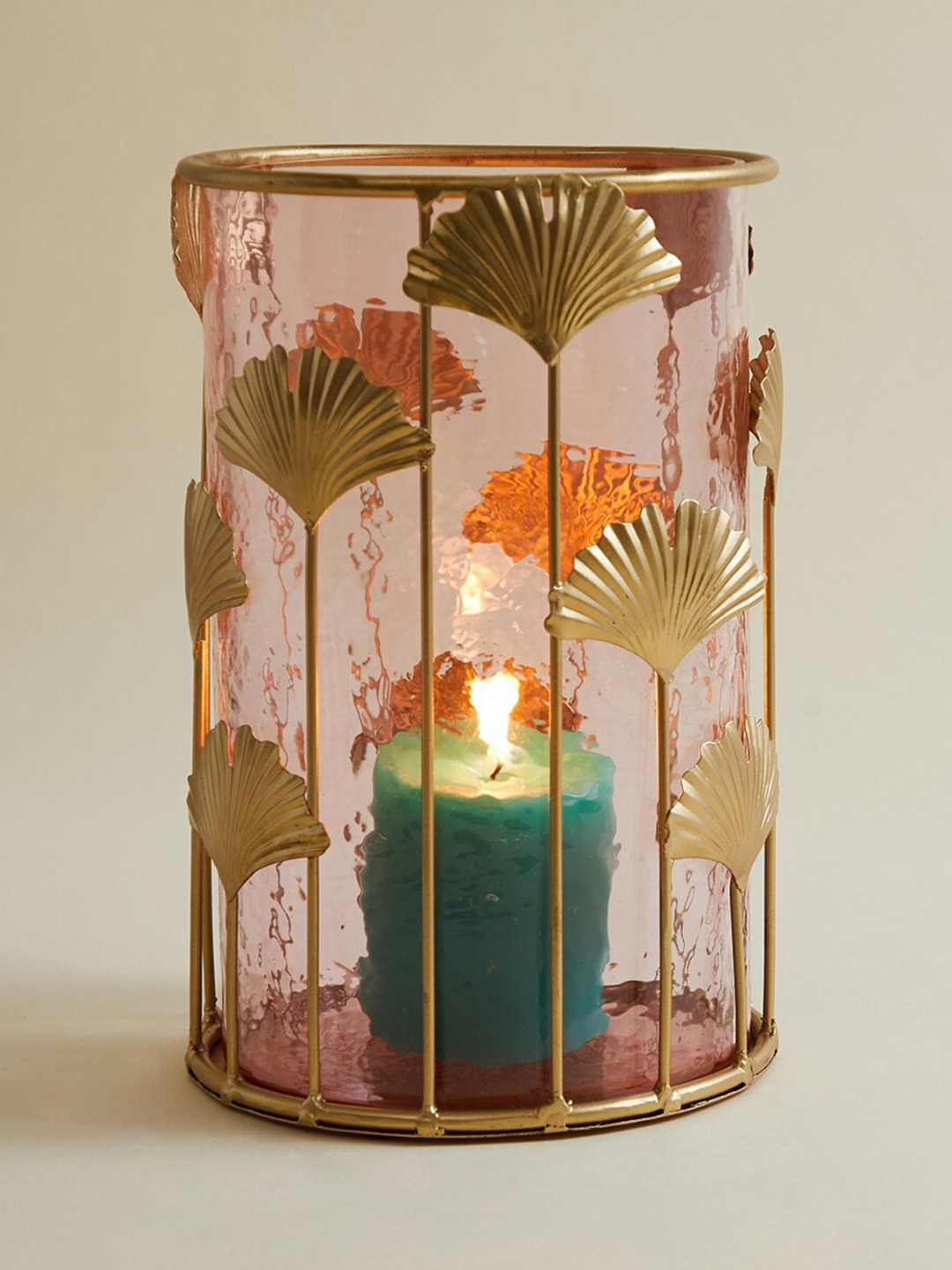 

Home Centre Gold-Toned Candle Holder With Leaf Frame