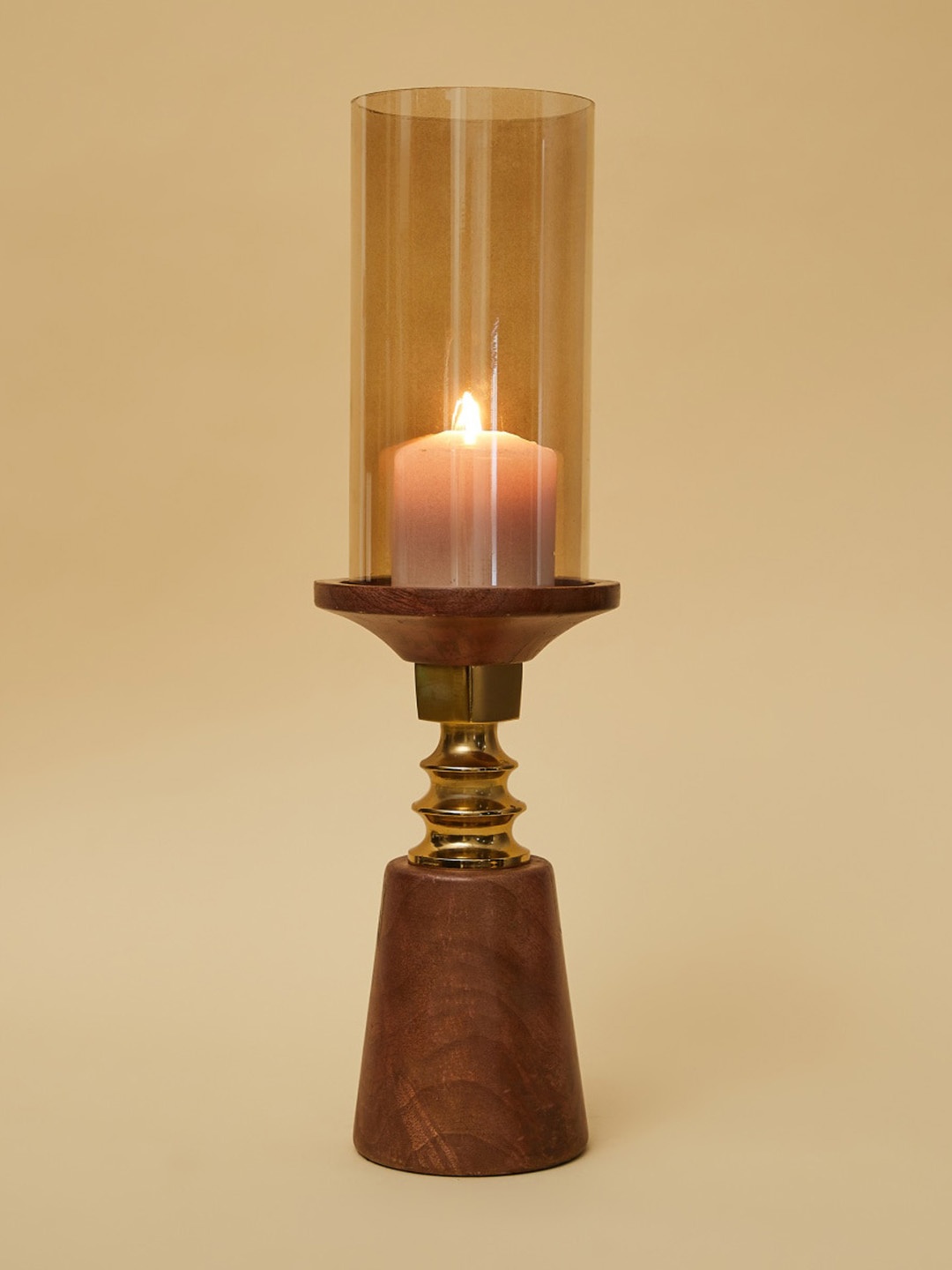 

Home Centre Gold-Toned Solid Hurricane Glass Candle Holder