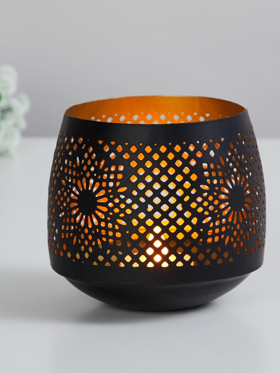 

Home Centre Black Textured Floral Cutwork Metal Floor Votive Holder
