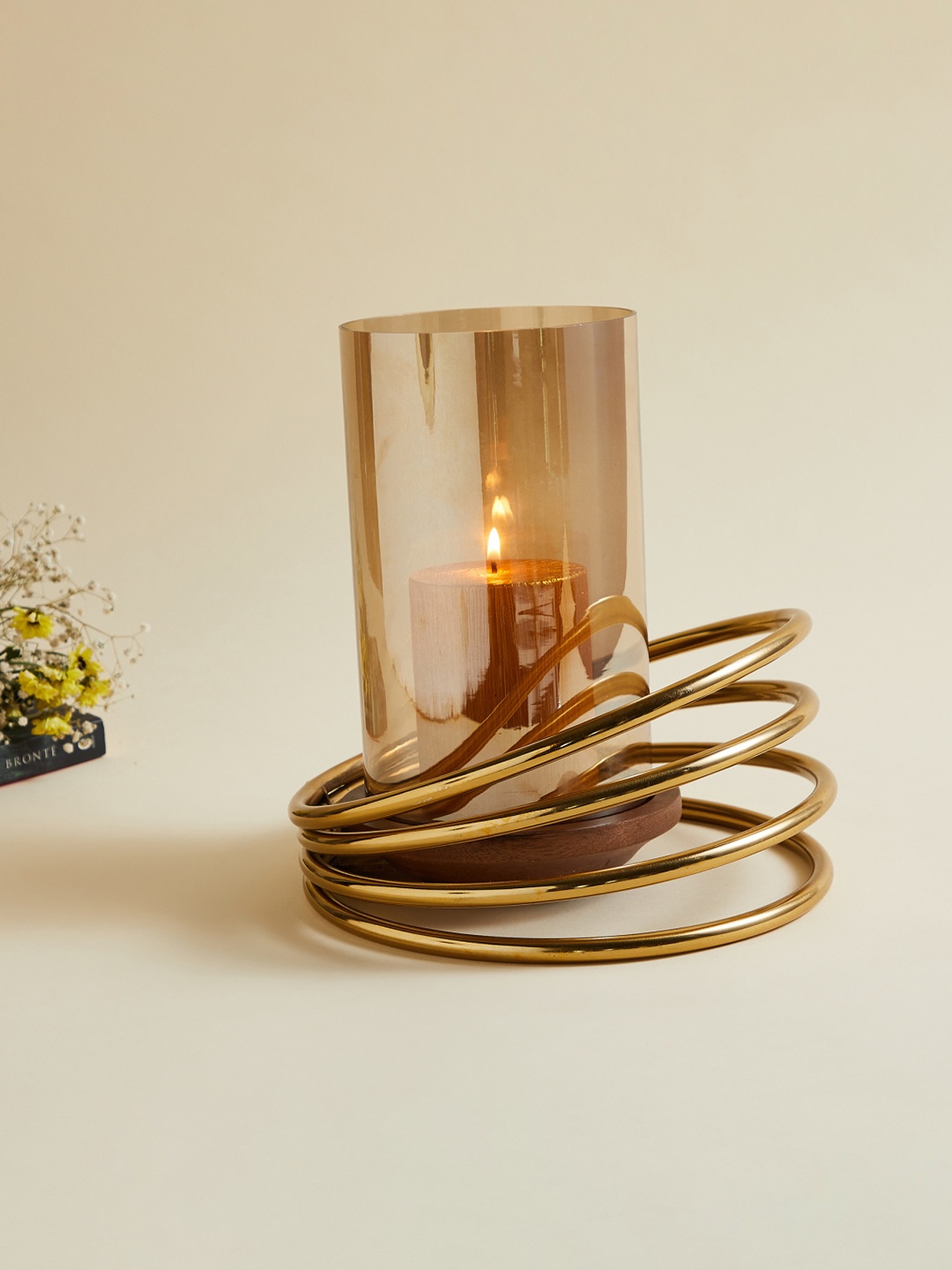 

Home Centre Gold-Toned Solid Glass Hurricane With Metal Stand