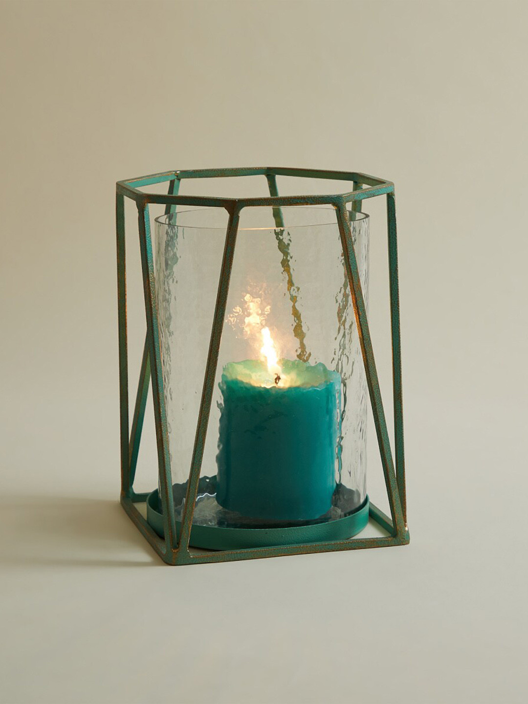 

Home Centre Teal Green Solid Cylindrical Candle Holders