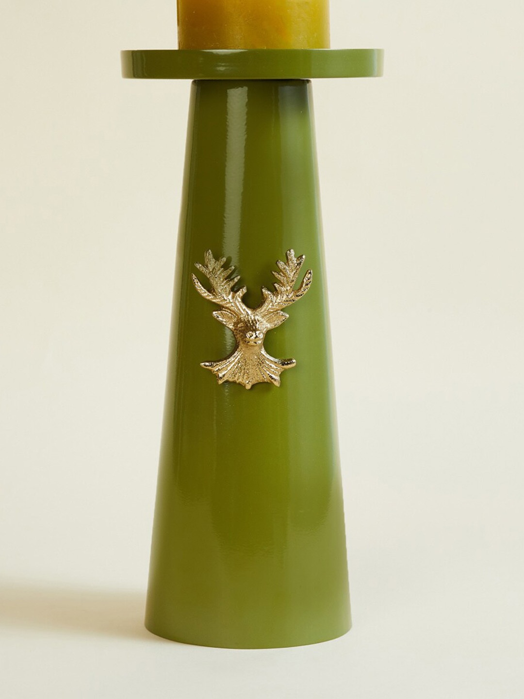 

Home Centre Green Reindeer Embellished Pillar Metal Candle Holder