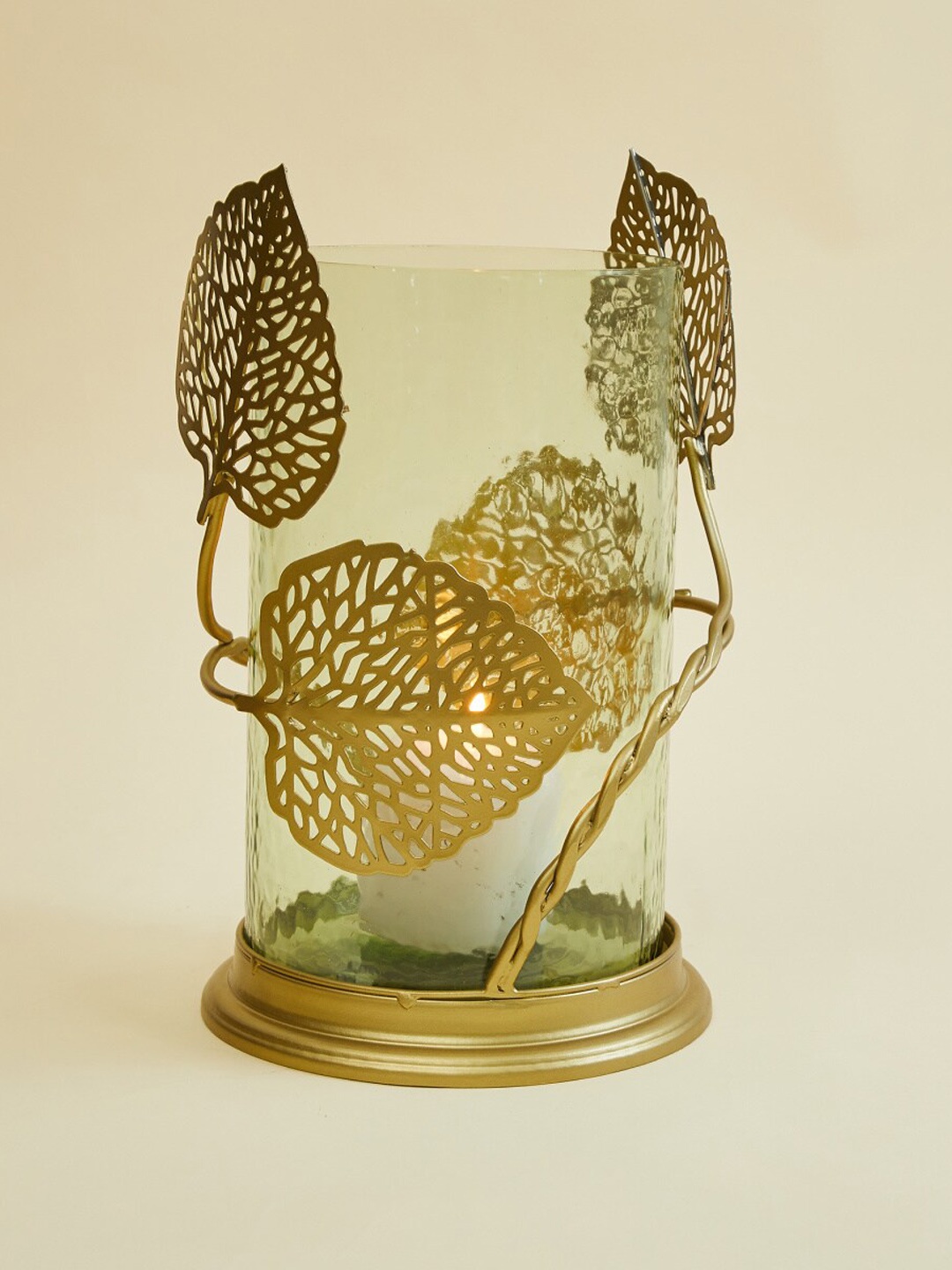 

Home Centre Gold-Toned Textured Cylindrical Candle Holder with Metal Leaf Frame