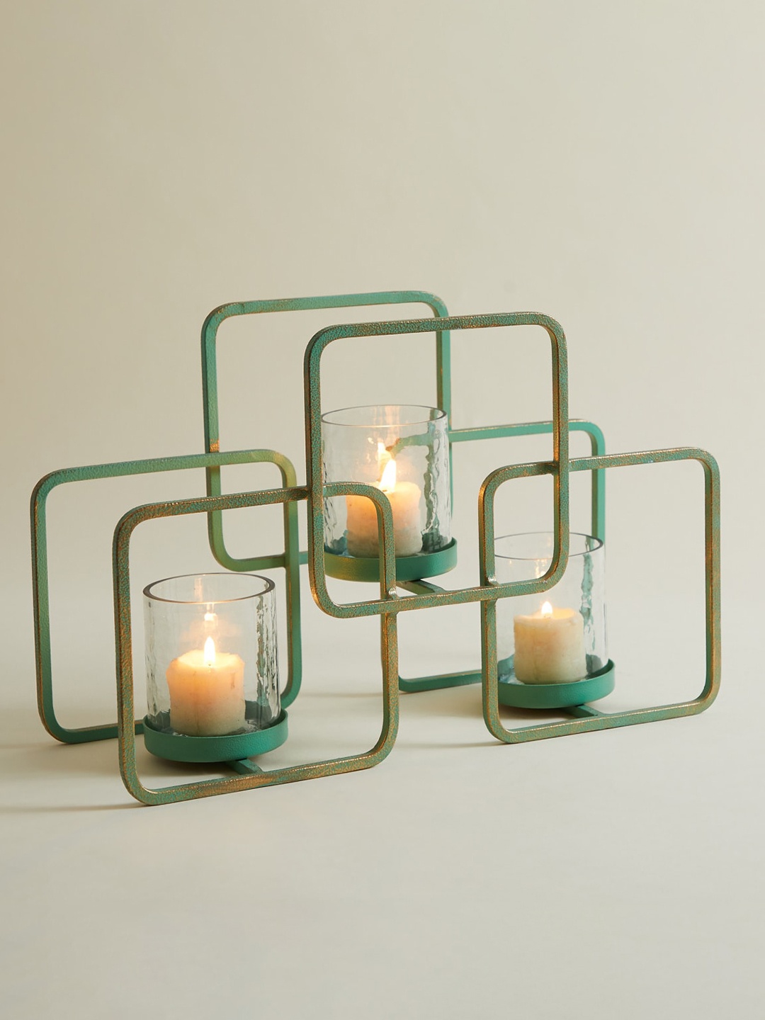 

Home Centre Green Solid Metal Candle Holder