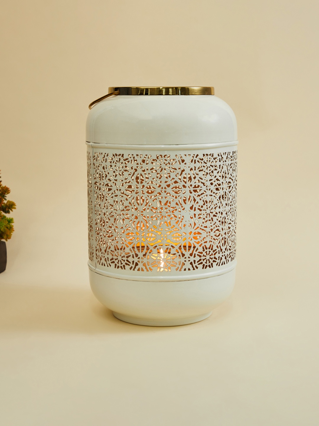 

Home Centre White Carved T-Light Candle Holders