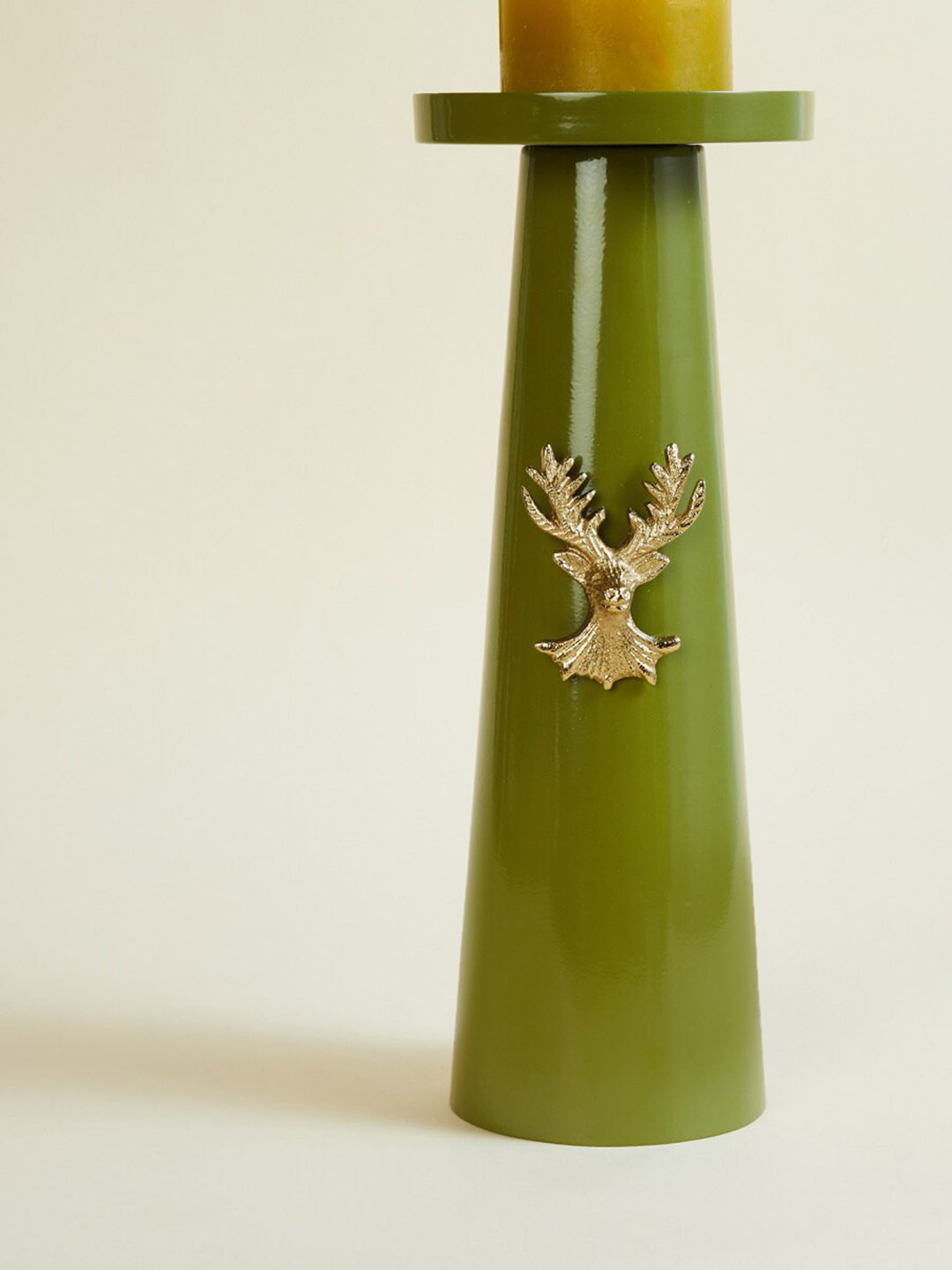 

Home Centre Green Solid Reindeer Pillar Metal Candle Holder