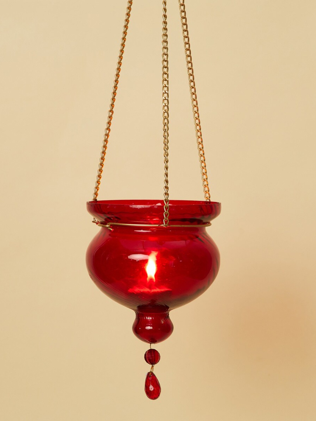 

Home Centre Red Textured Hanging T-Light Candle Holders