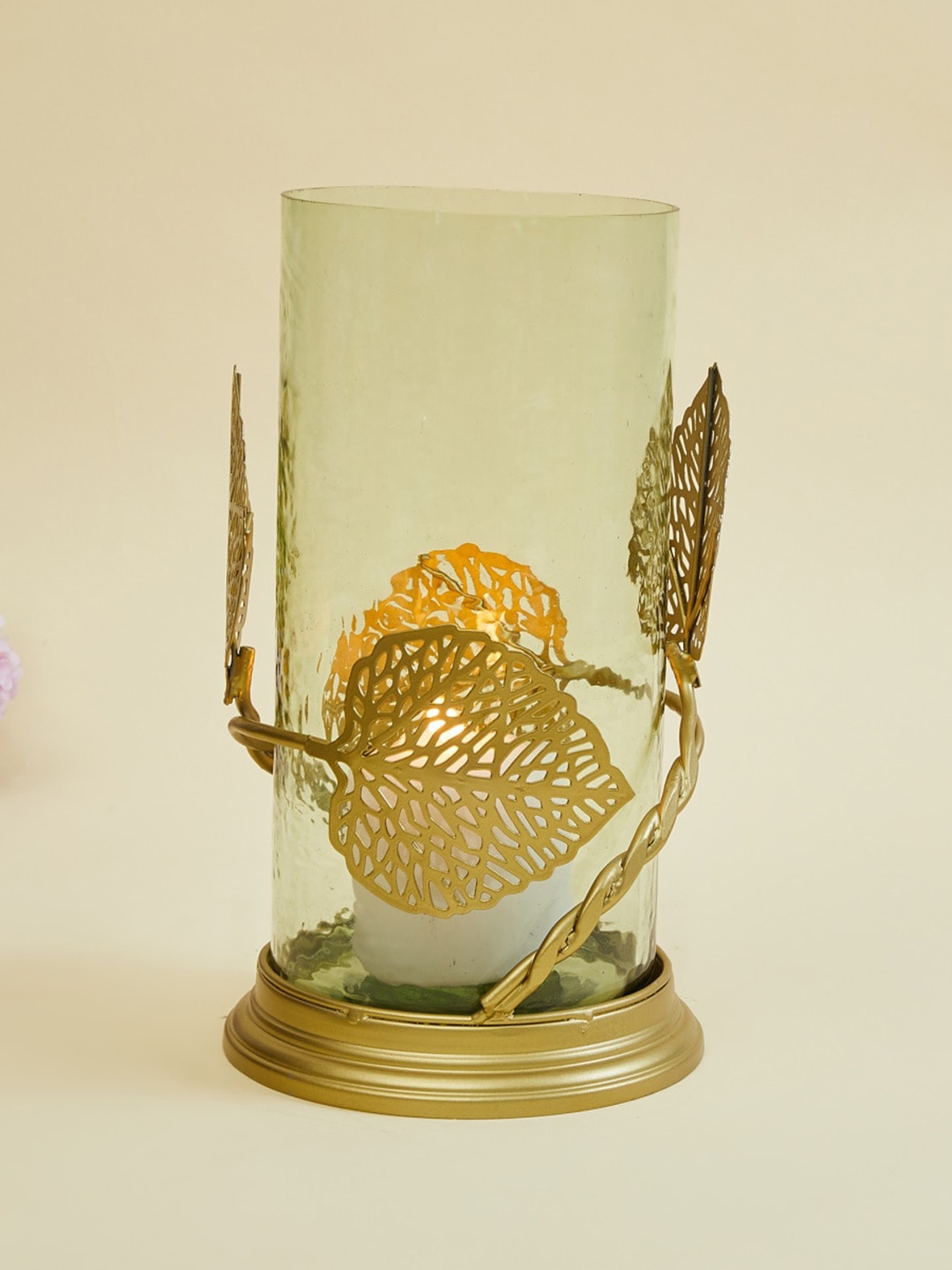 

Home Centre Gold-Toned Textured Cylindrical Glass Candle Holder With Metal Leaf