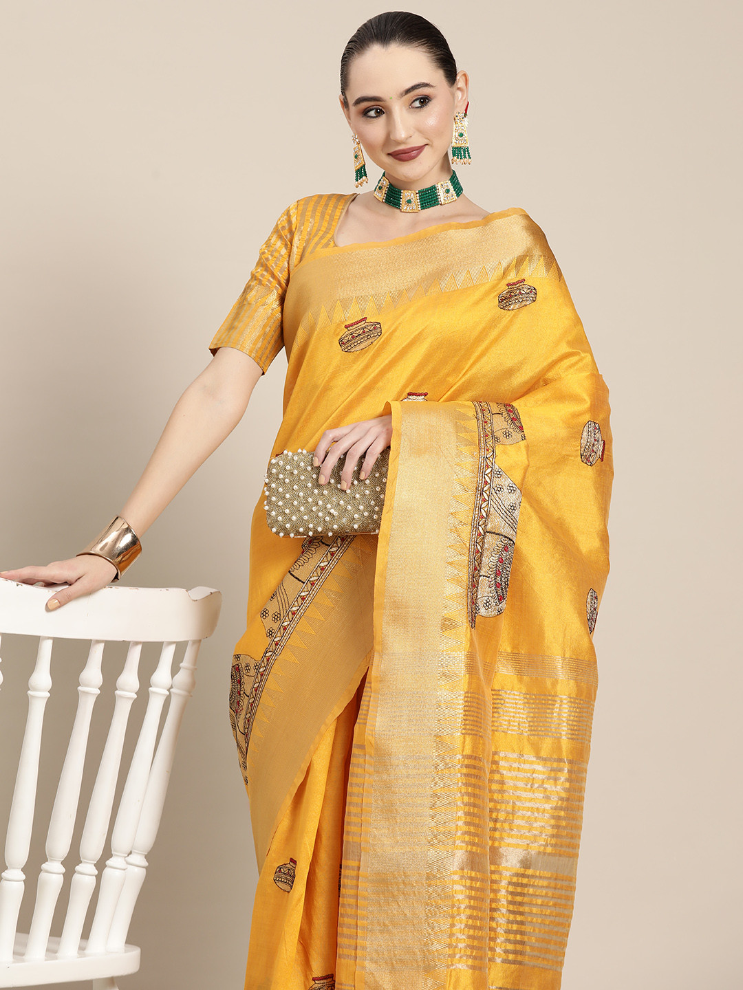 

Mitera Yellow Ethnic Motifs Silk Cotton Chanderi Saree