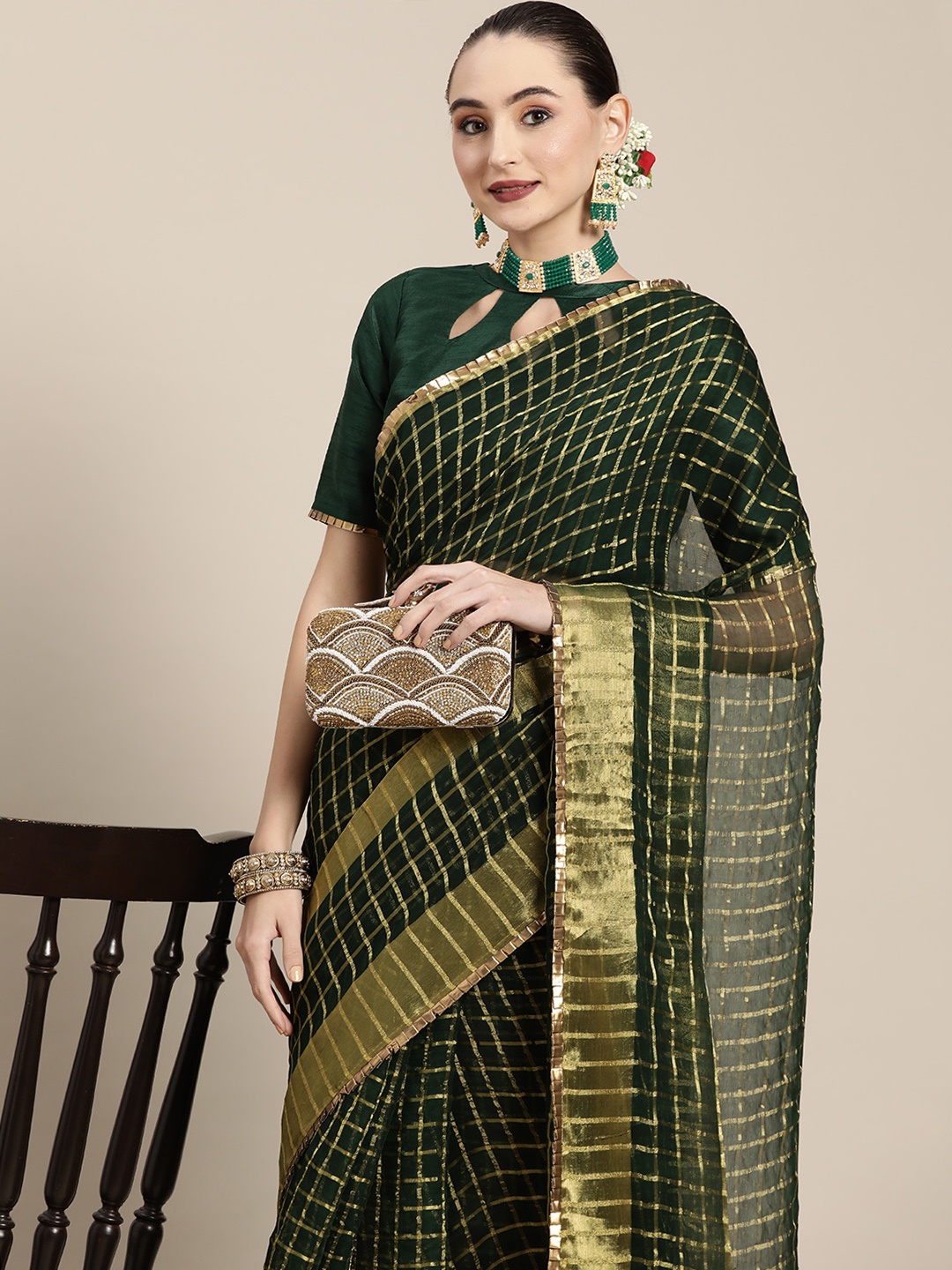 

Mitera Green Banarasi Woven Design Saree