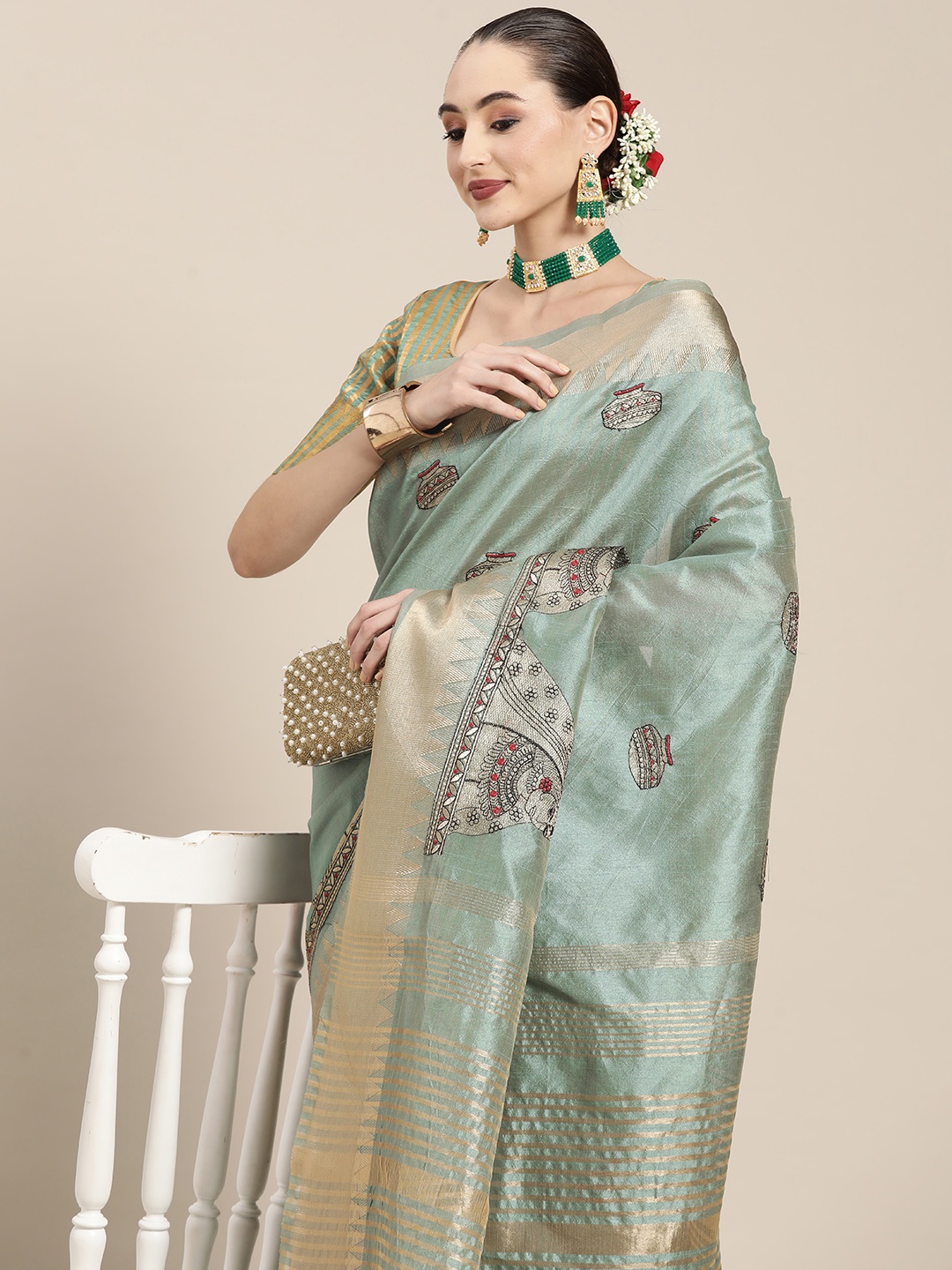 

Mitera Turquoise Blue Ethnic Motifs Silk Cotton Chanderi Saree