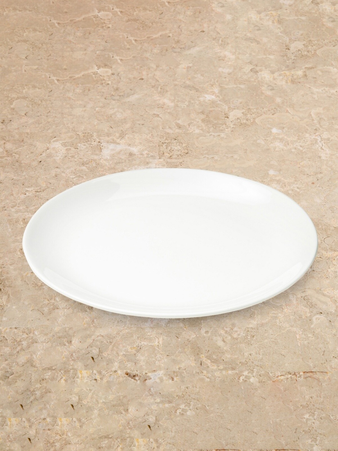 

Home Centre White & 1 Pieces Bone China Matte Plates