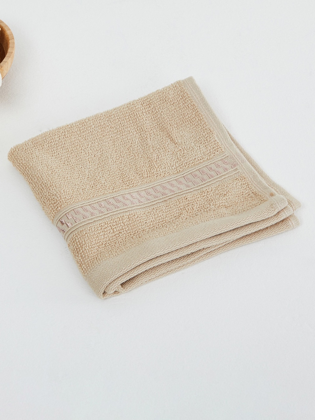 

Home Centre Beige Solid 450 GSM Cotton Face Towel