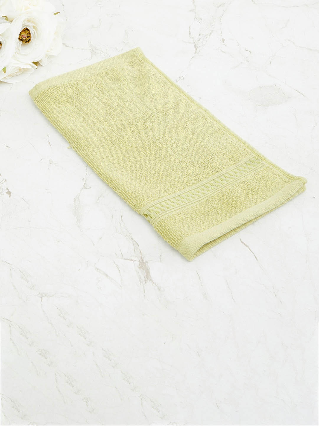 

Home Centre Yellow Solid 450 GSM Single Cotton Face Towel