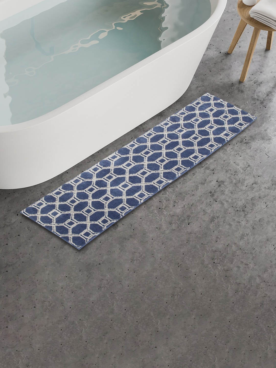 

Home Centre Navy Blue & Off White Geometric Patterned 350 GSM Woven Bath Rug