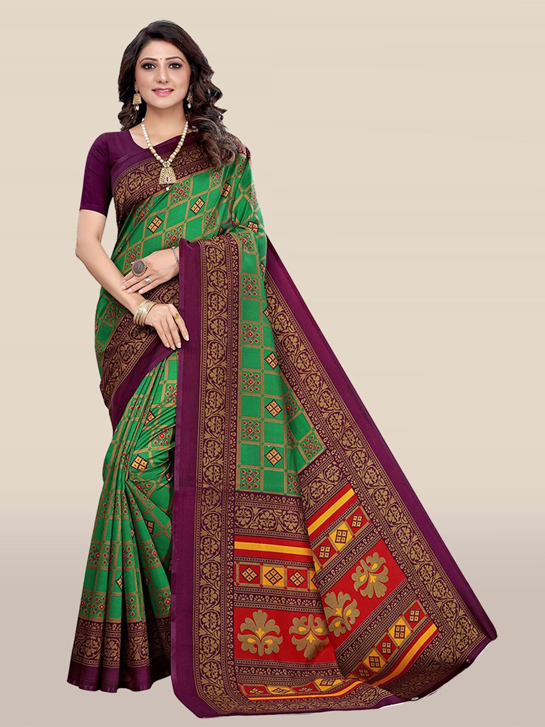 

KALINI Green & Purple Ethnic Motifs Art Silk Saree