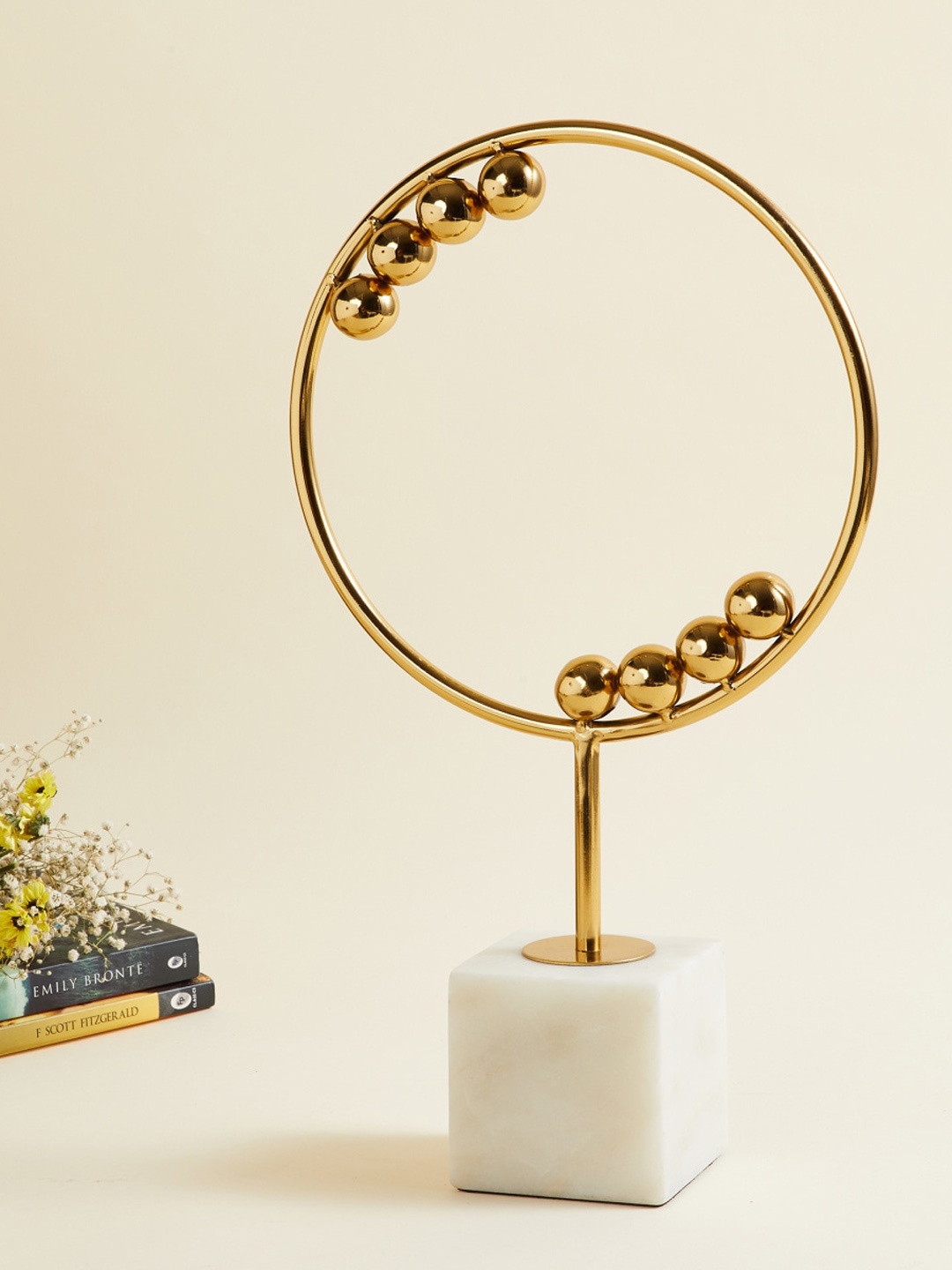 

Home Centre Gold-Toned Marble Table Accent Showpiece