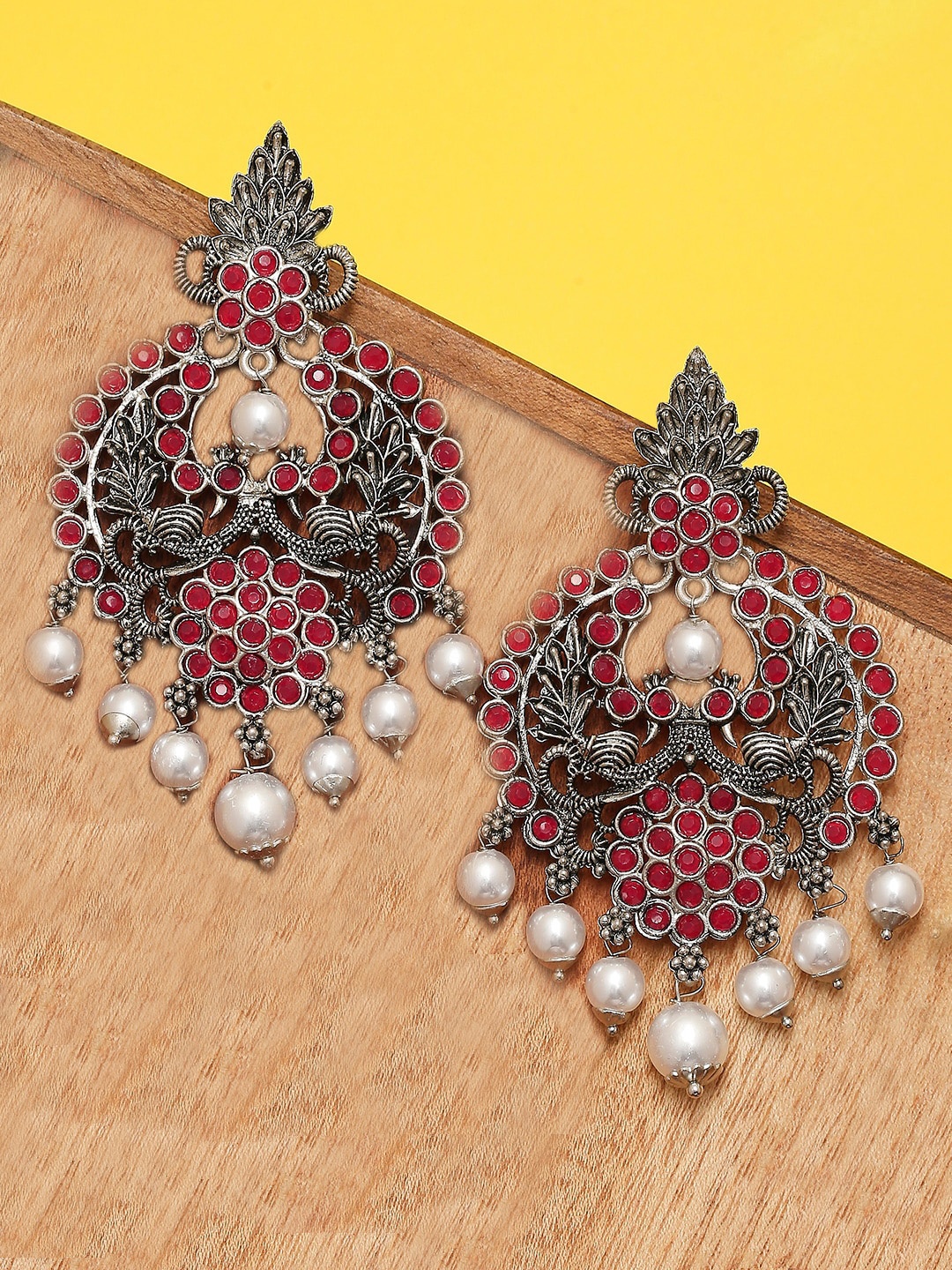 

OOMPH Oxidised Silver Tone Peacock Shaped Chandbalis Earrings