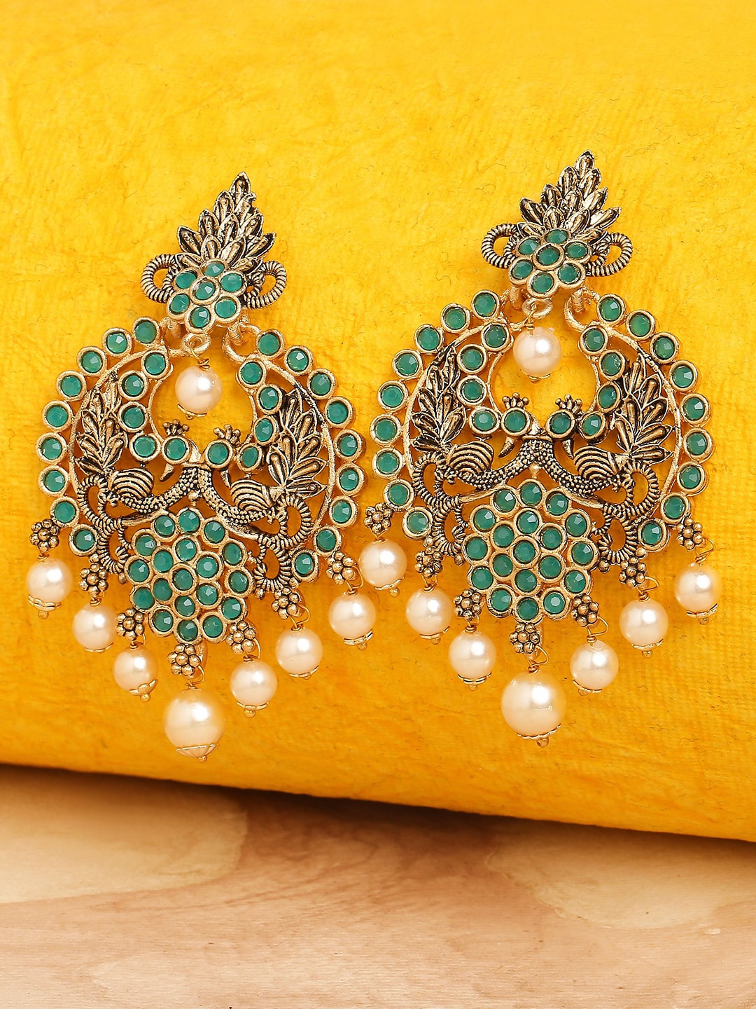 

OOMPH Gold-Toned Peacock Shaped Chandbalis Earrings