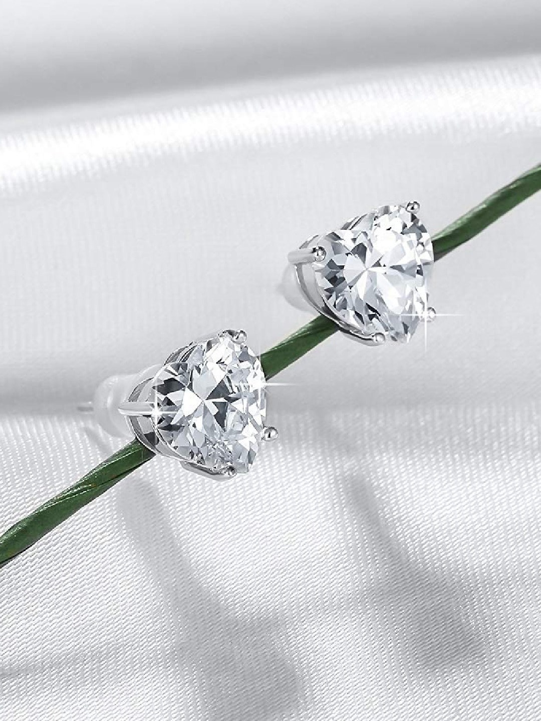

OOMPH Silver-Toned Cubic Zirconia Heart Shaped Studs Earrings