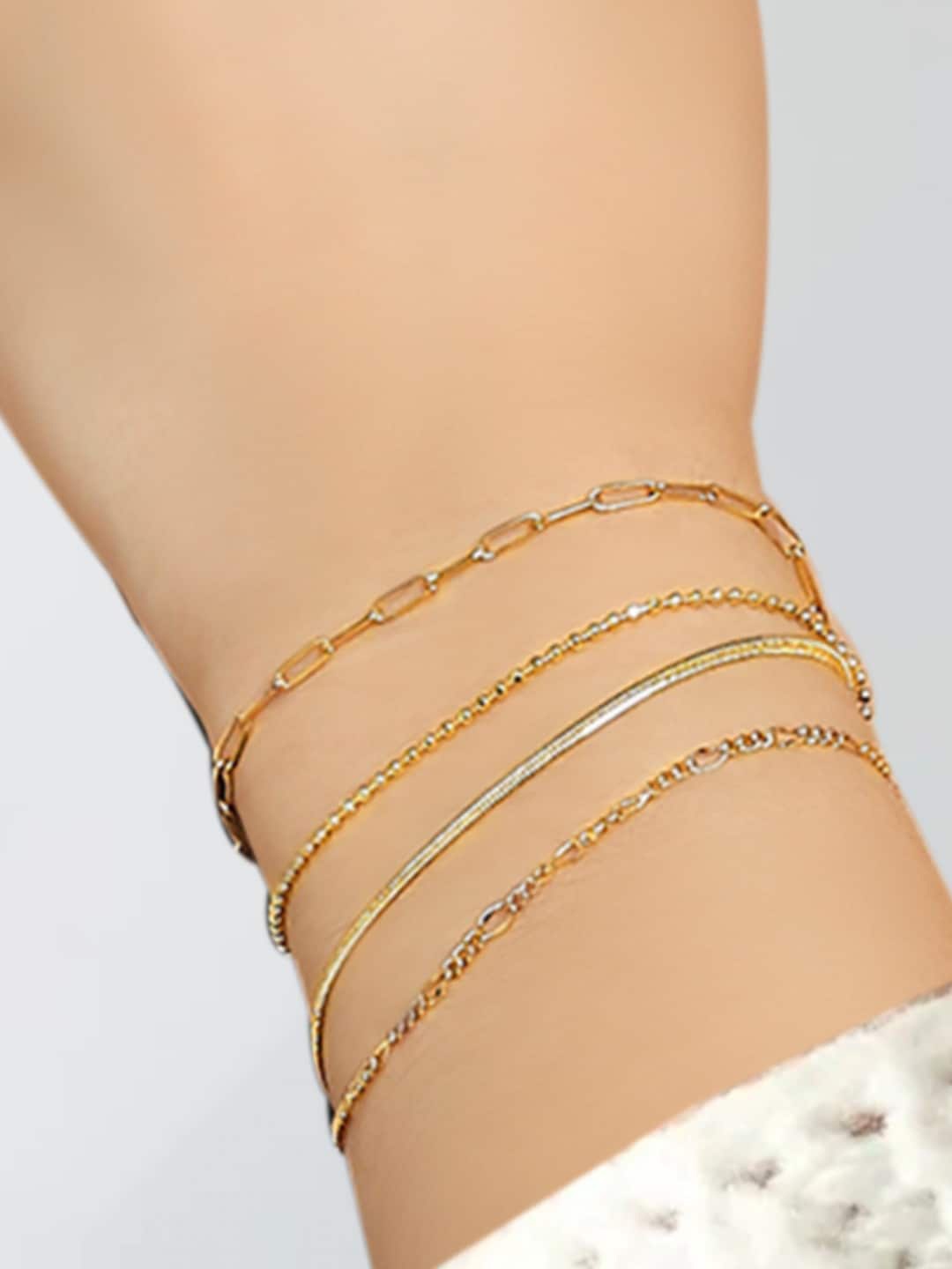 

OOMPH Women Pack of 4 Gold-Plated Multi strand Bracelets