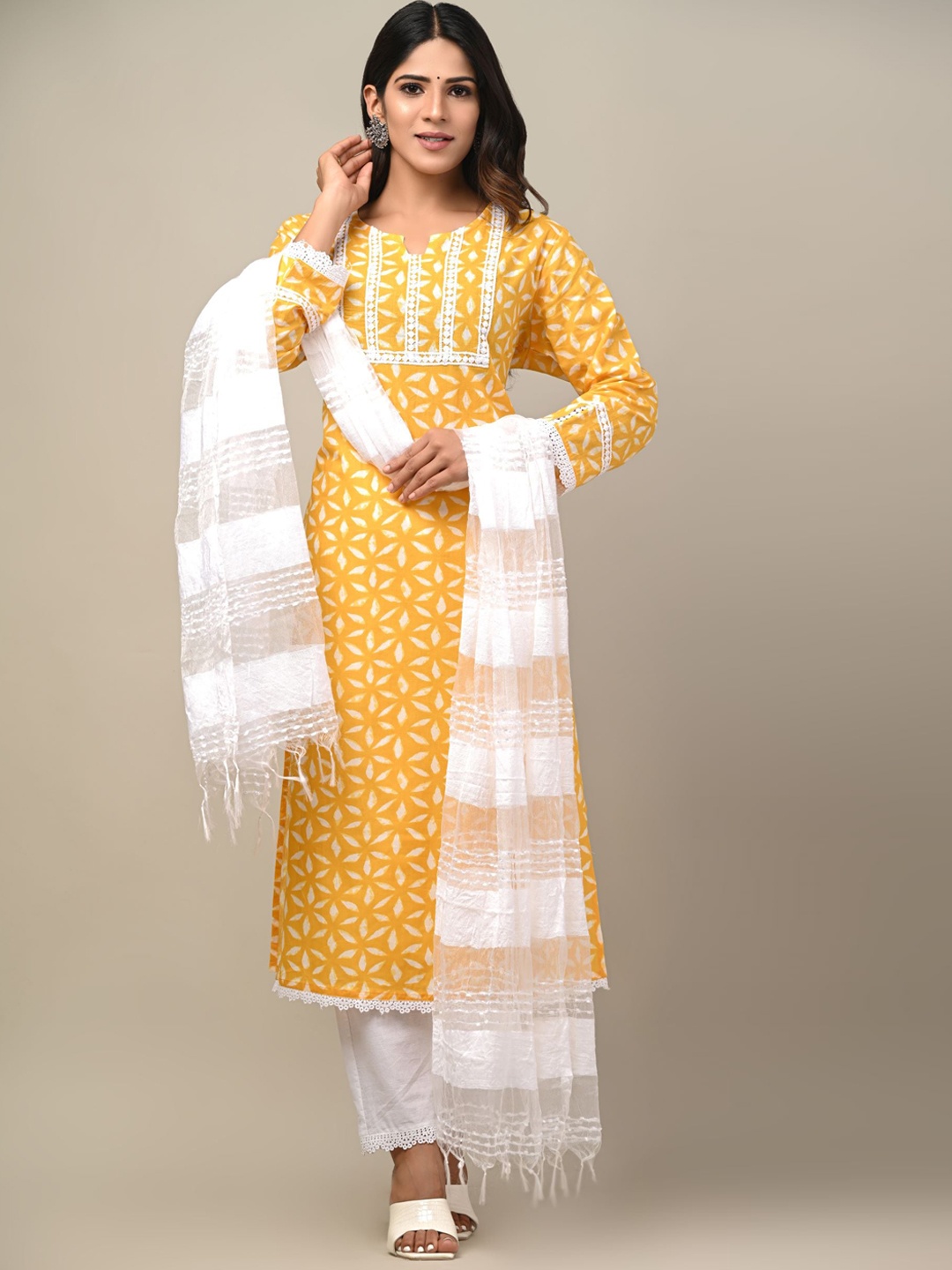 

DHRTI Women Yellow Floral Printed Pure Cotton Kurta with Palazzos & With Dupatta