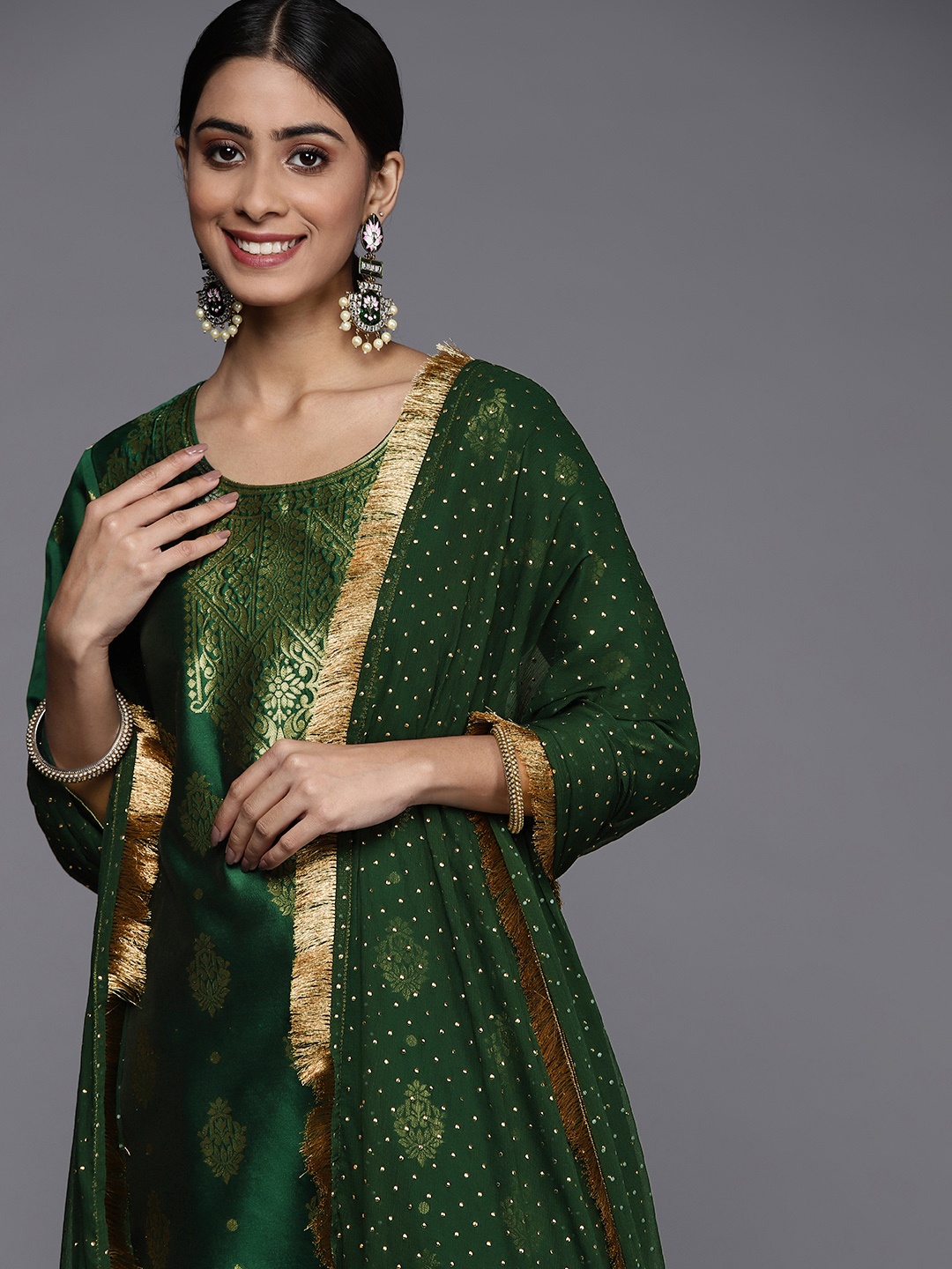 

Varanga Women Green Ethnic Motifs Yoke Design Kurta with Trousers & With Dupatta