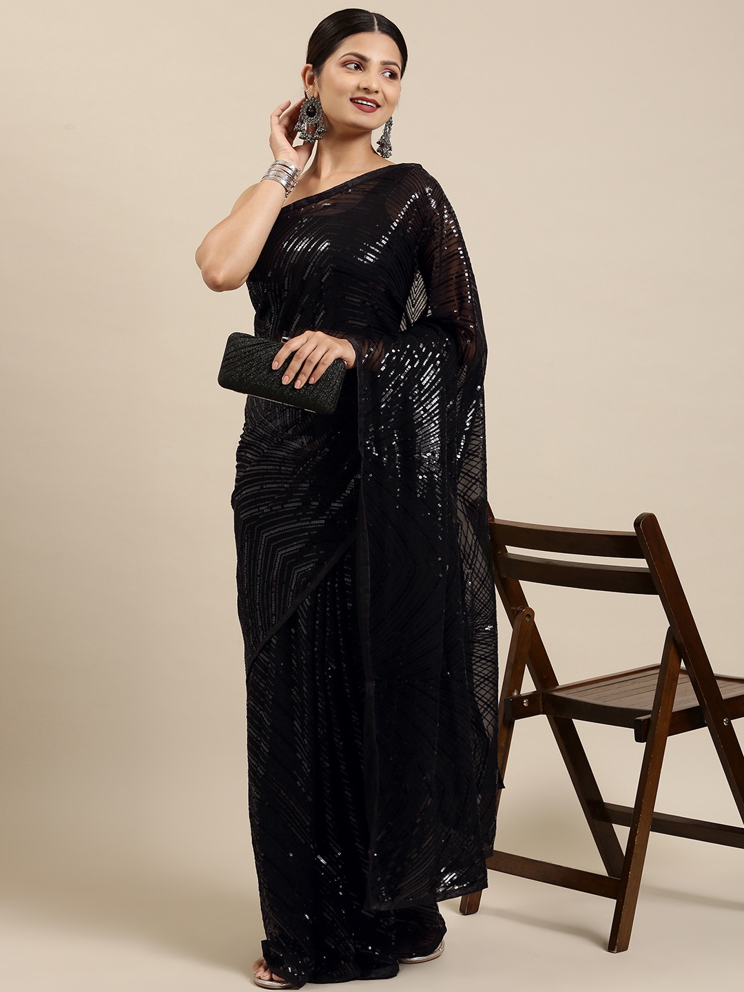 

Pothys Black Embellished Sequinned Pure Chiffon Saree