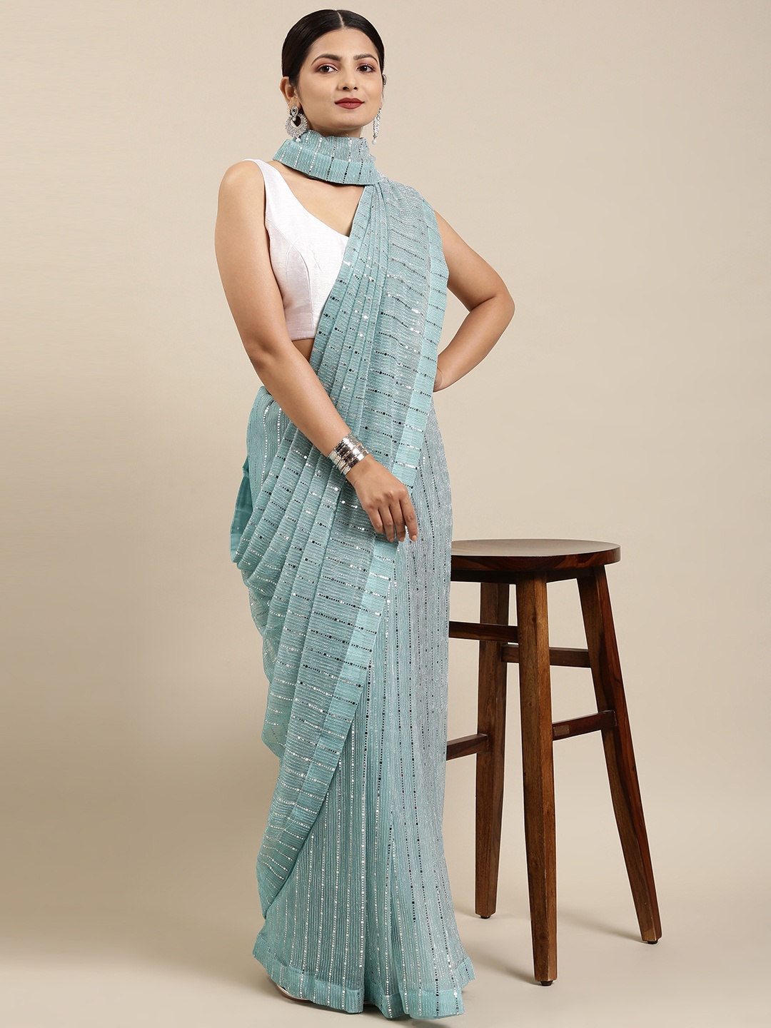 

Pothys Blue Embellished Sequinned Tissue Saree