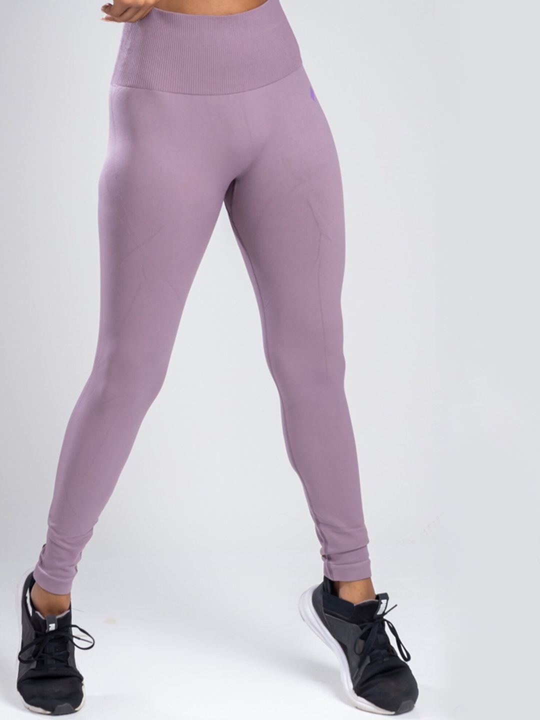 

SKNZ Women Purple Solid Antimicrobial Tights