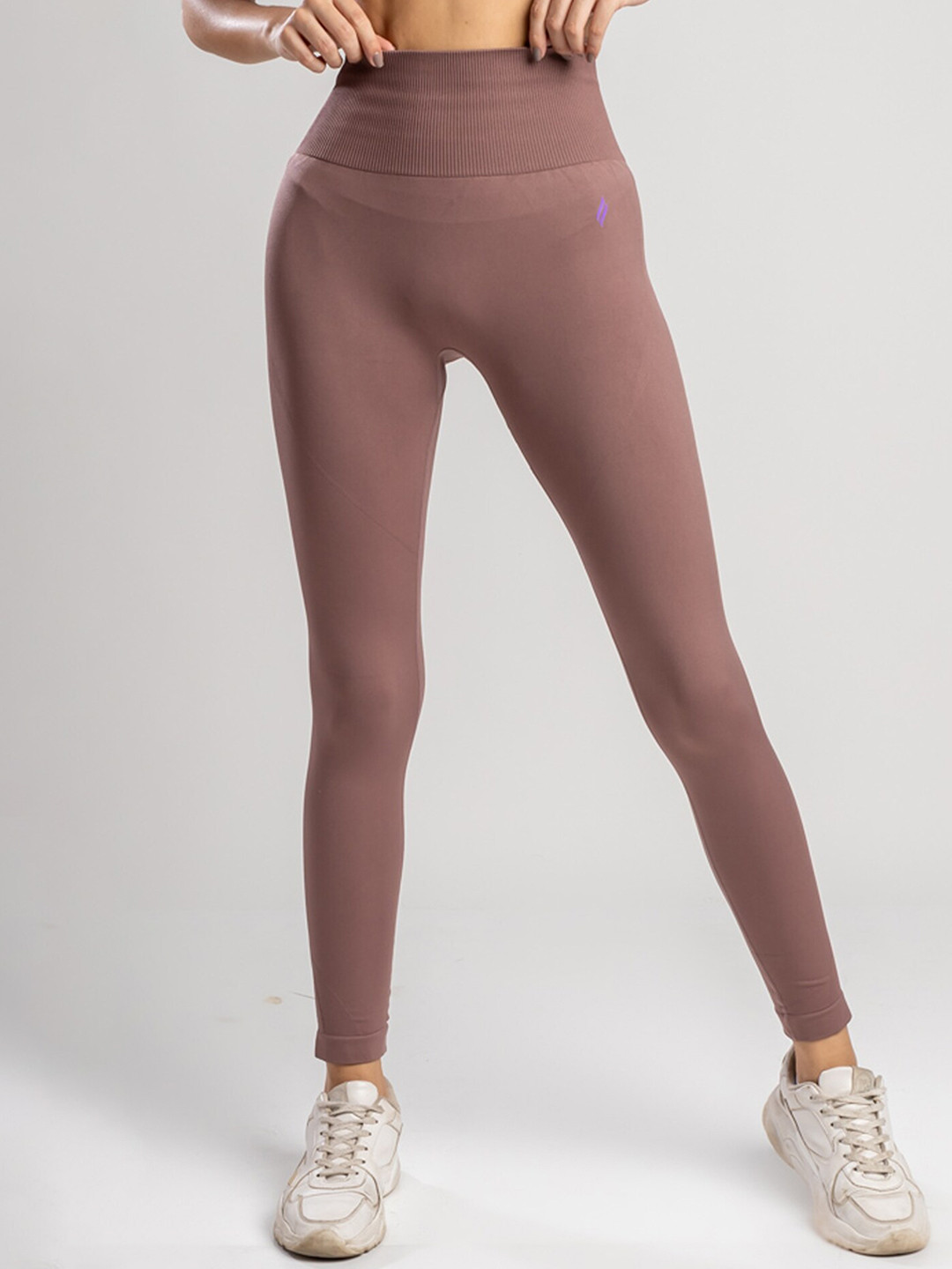 

SKNZ Women Purple Solid Antimicrobial Tights, Peach